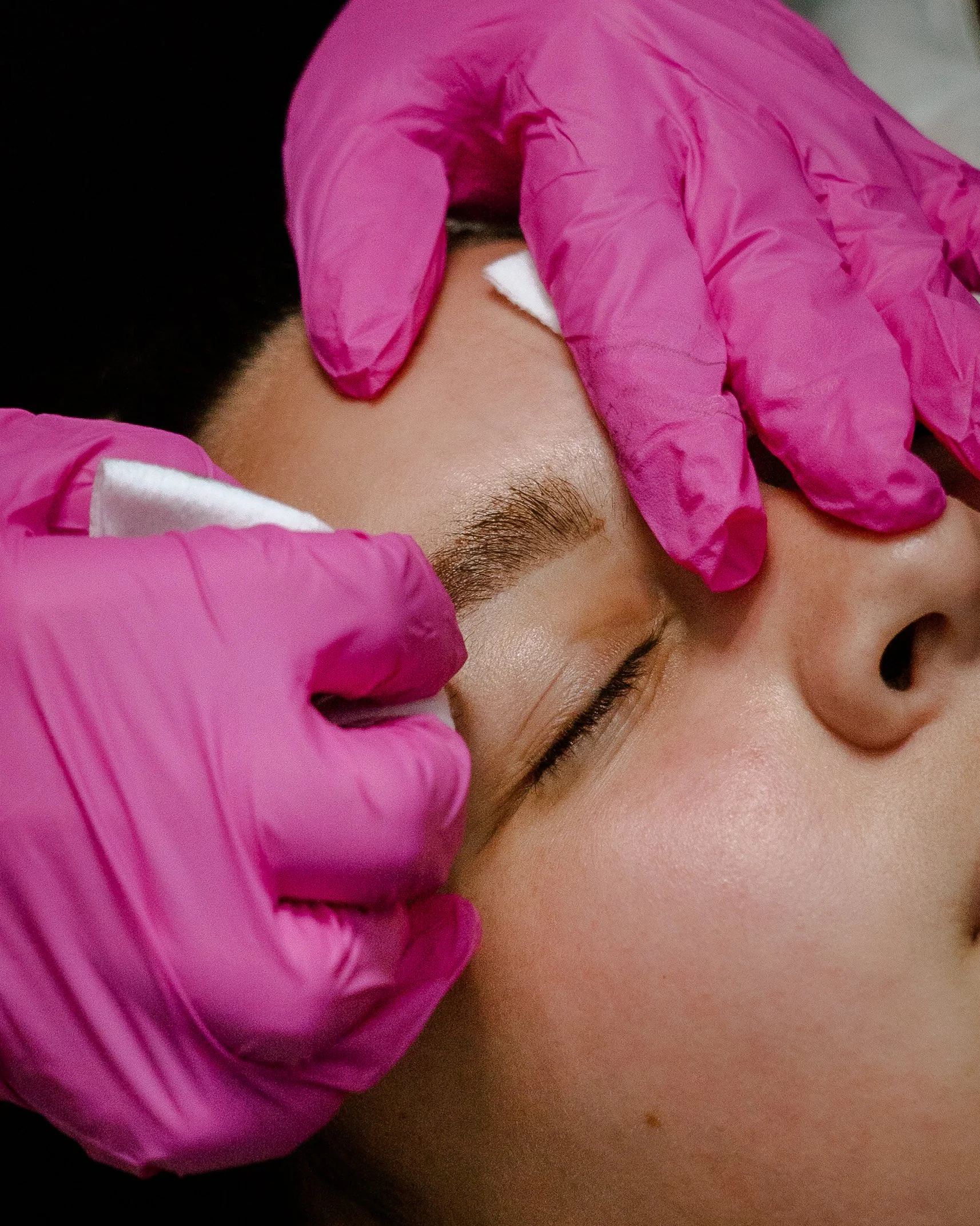 Woman getting brow tint done
