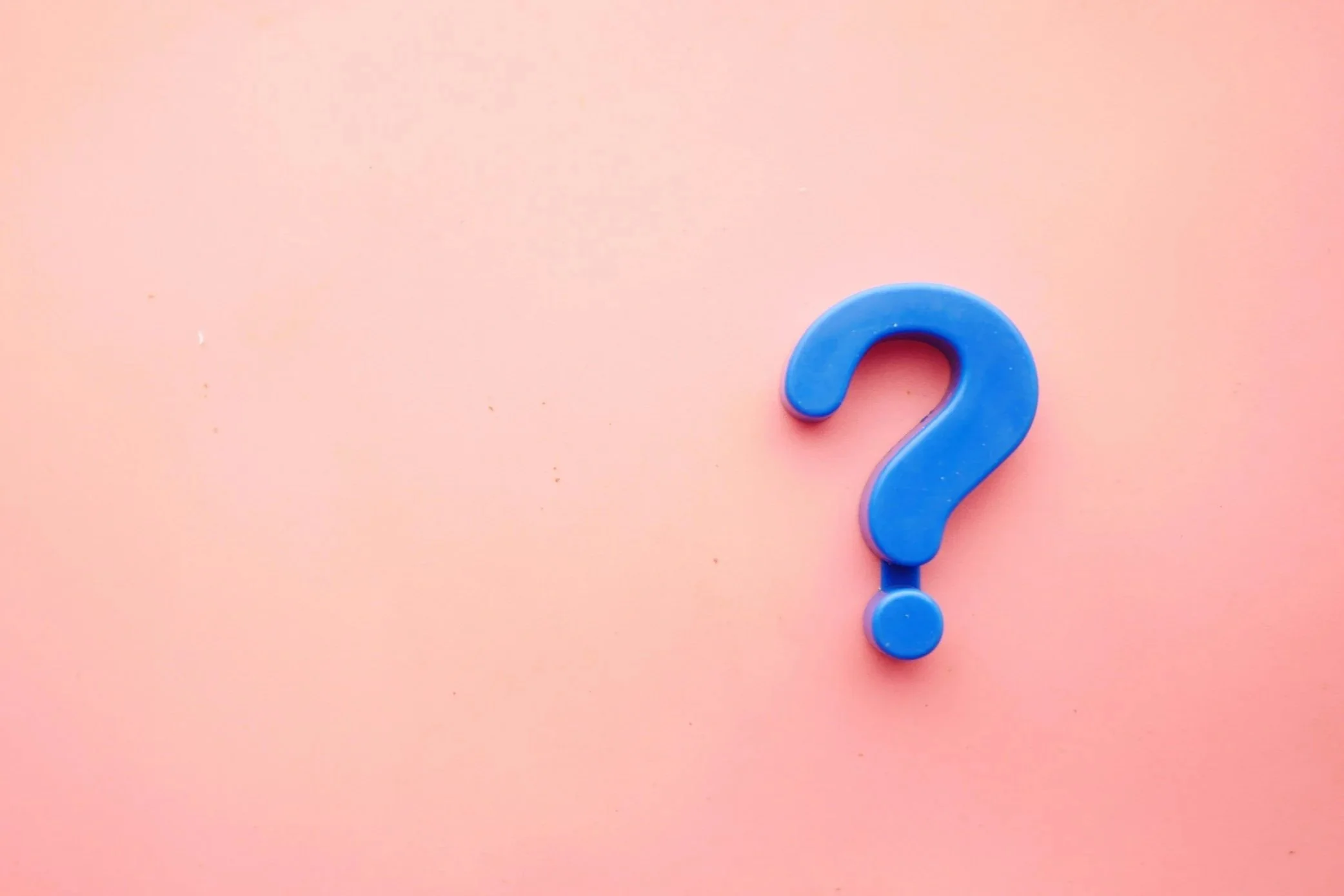 blue question mark on pink background