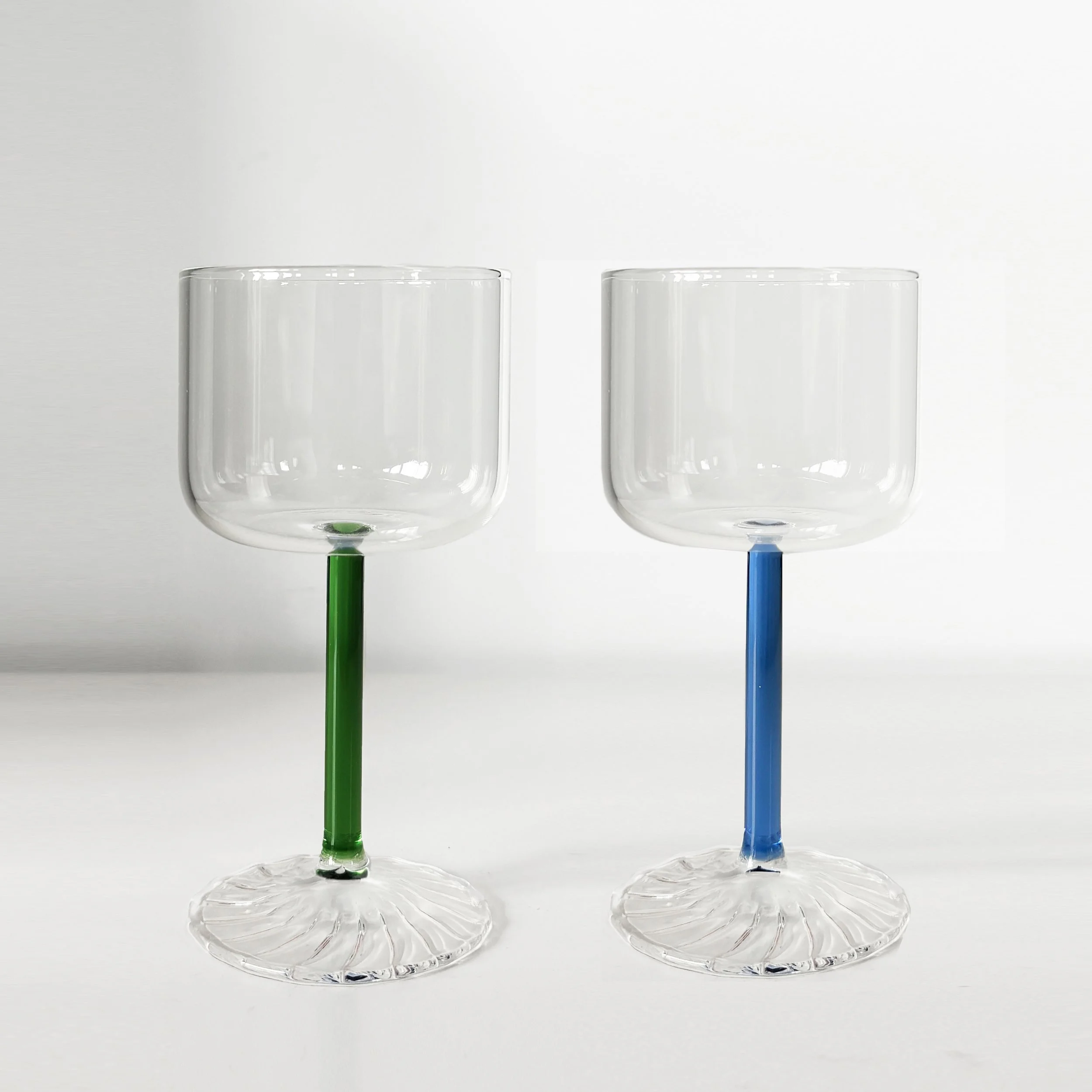 Mouth blown wine glass with green and blue stems