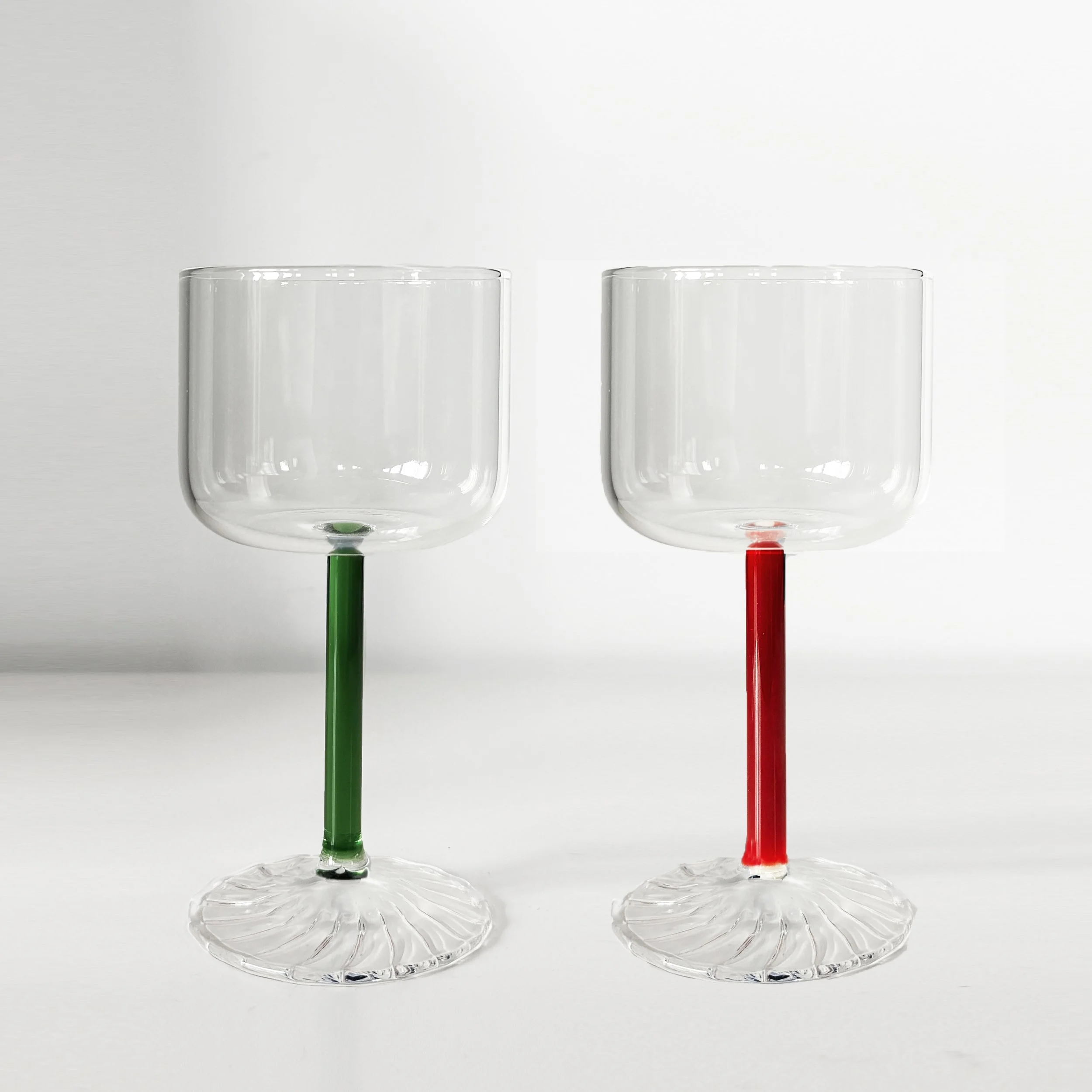 Mouth blown wine glass with green and red stems