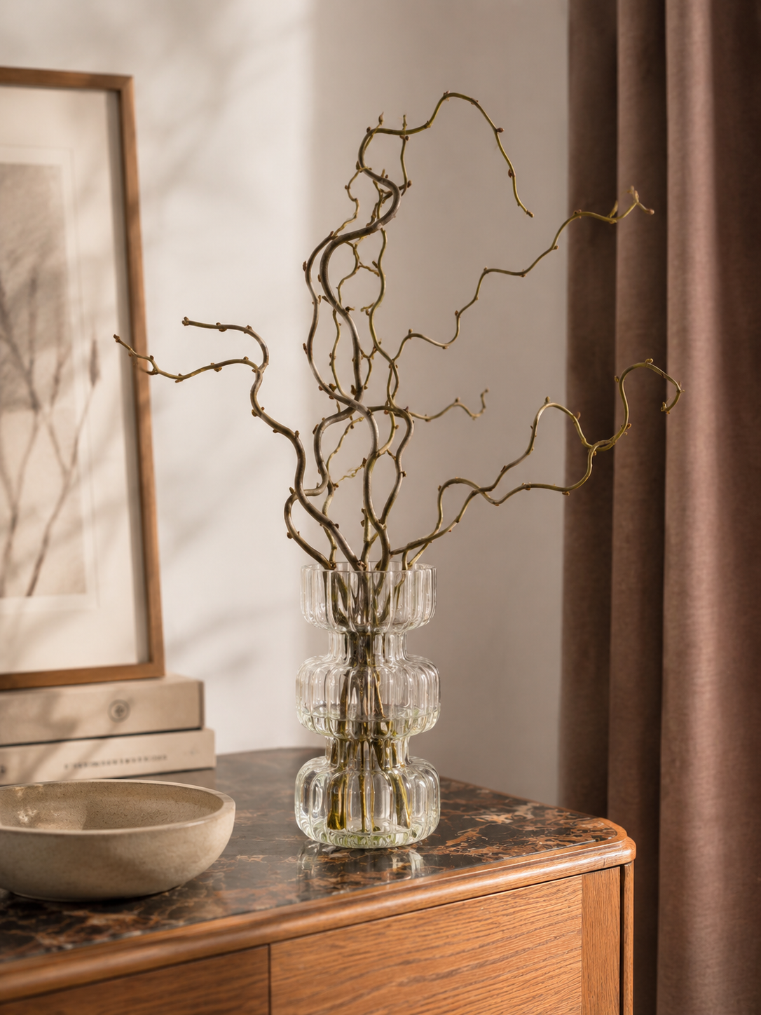Sculptural vase with autumnal foliage in it