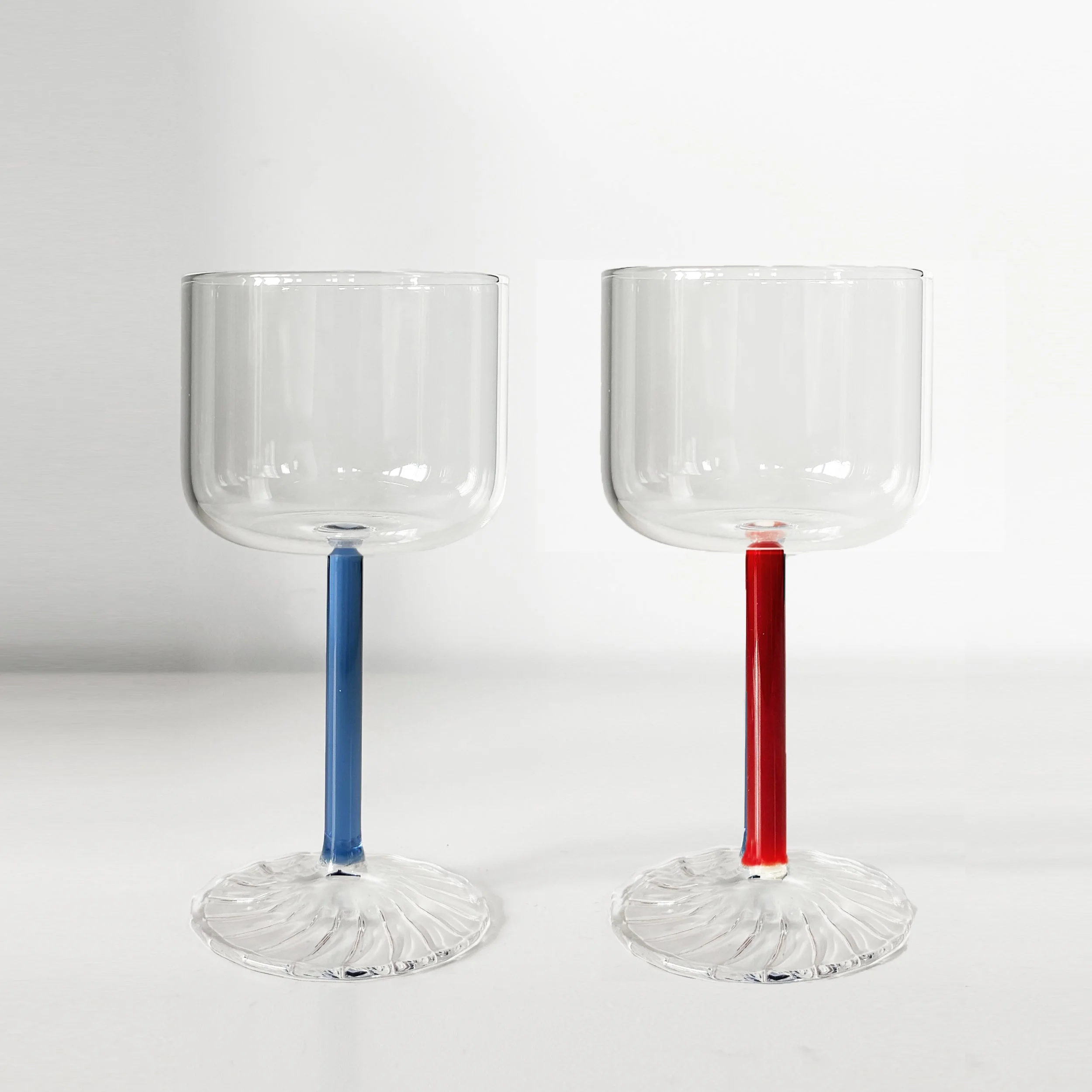 Mouth blown wine glass with blue and red stem