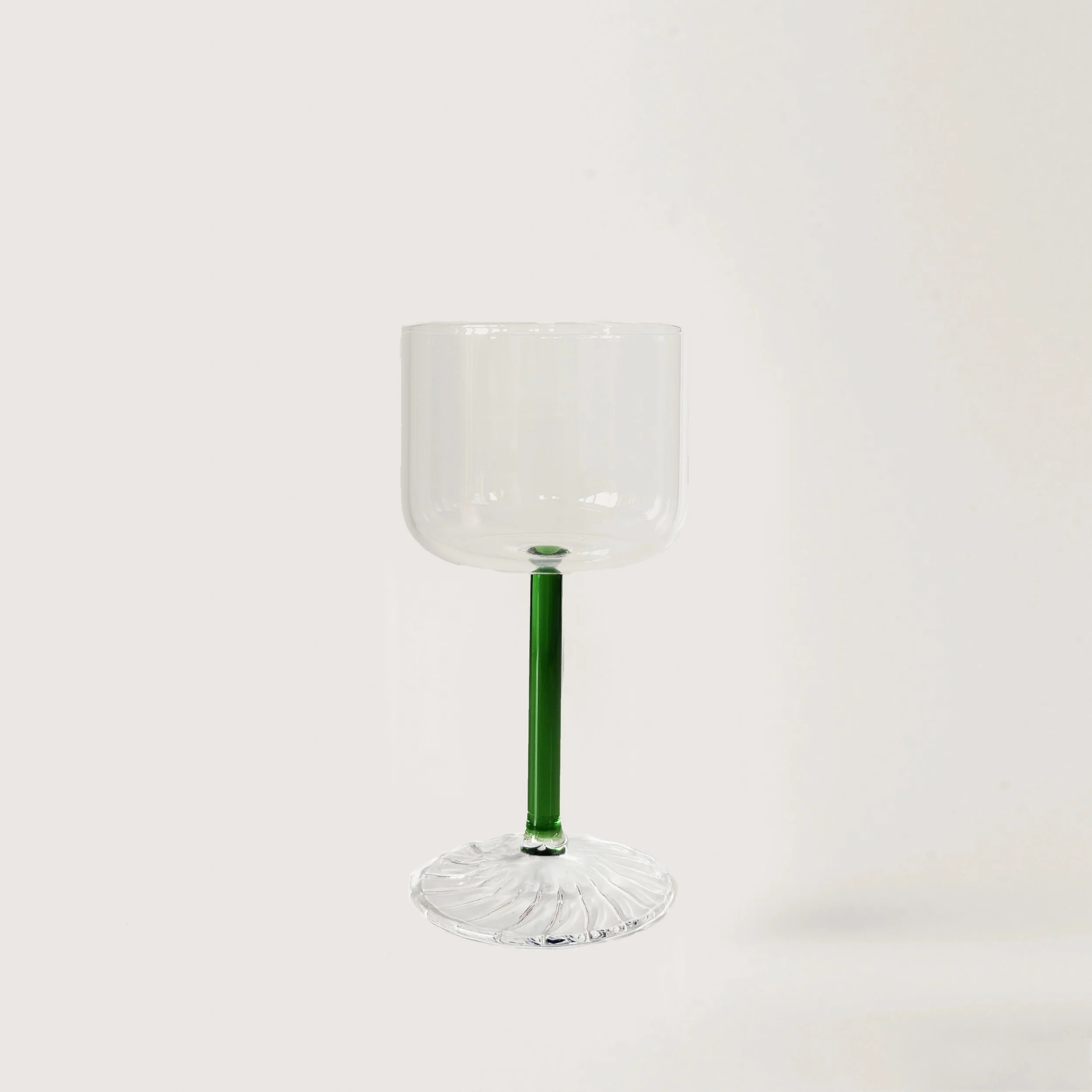 Mouth blown wine glass with green stem