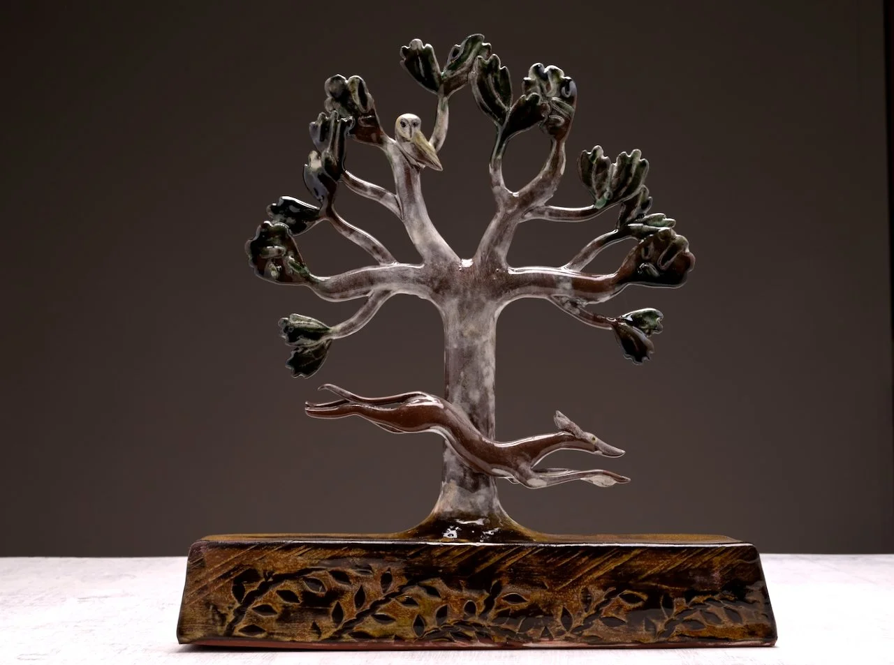 Running Dog and Tree