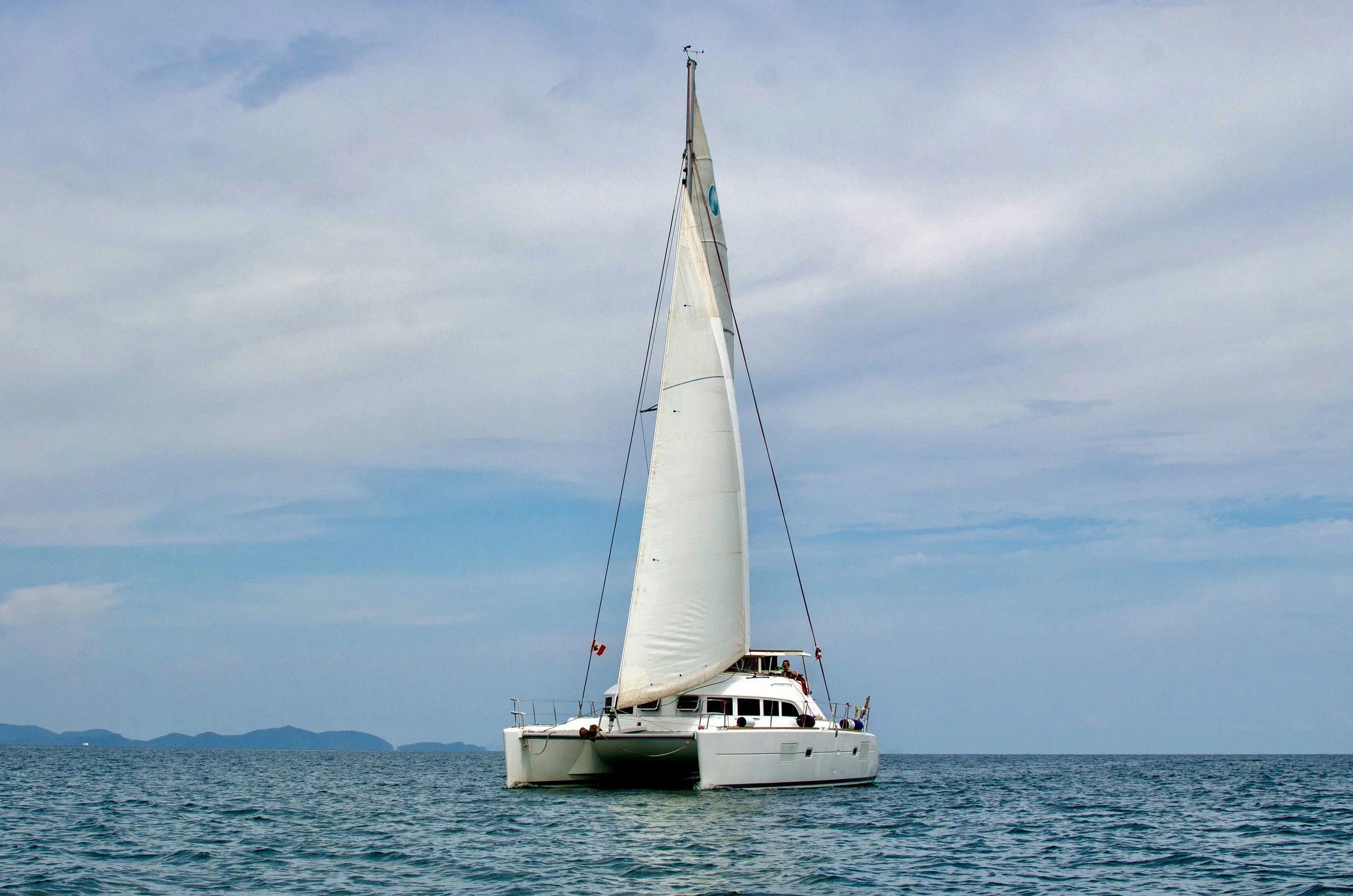 Sunset view from the deck of Logan's Run sailing catamaran in Phuket.jpg