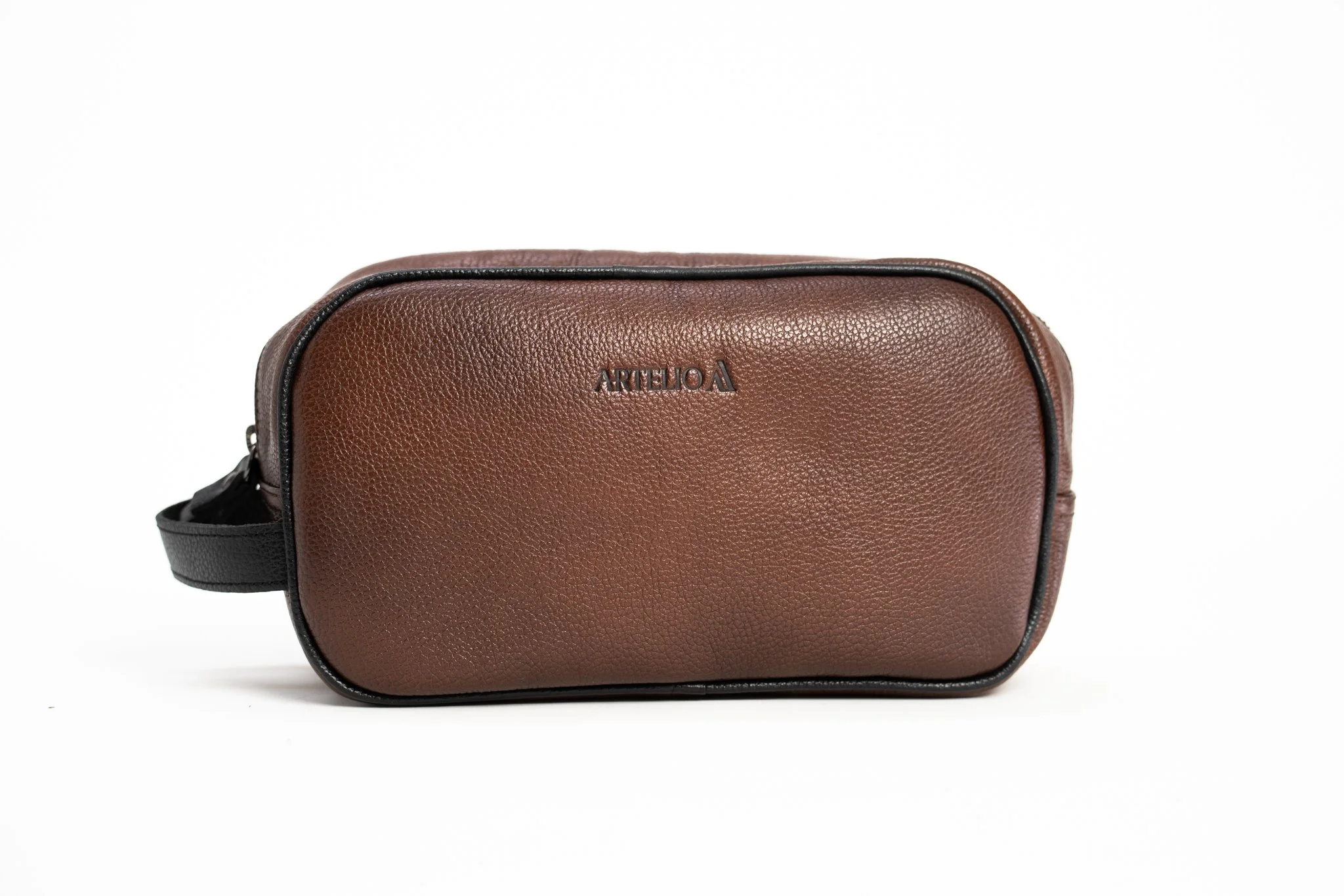 A brown textured crossbody bag with black trim and a black shoulder strap, featuring a brand logo on the front.
