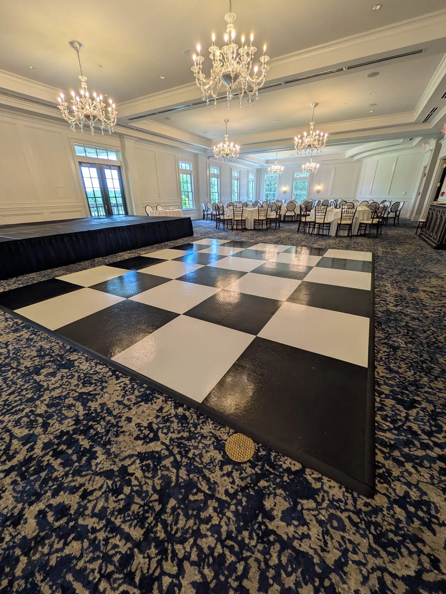 black and white checkered dance floor and stage at the governors towne club