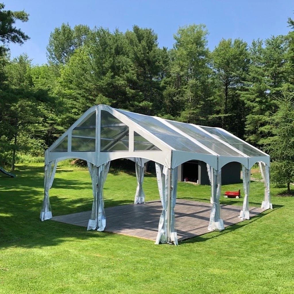 20x30 clear top frame tent with flooring outside