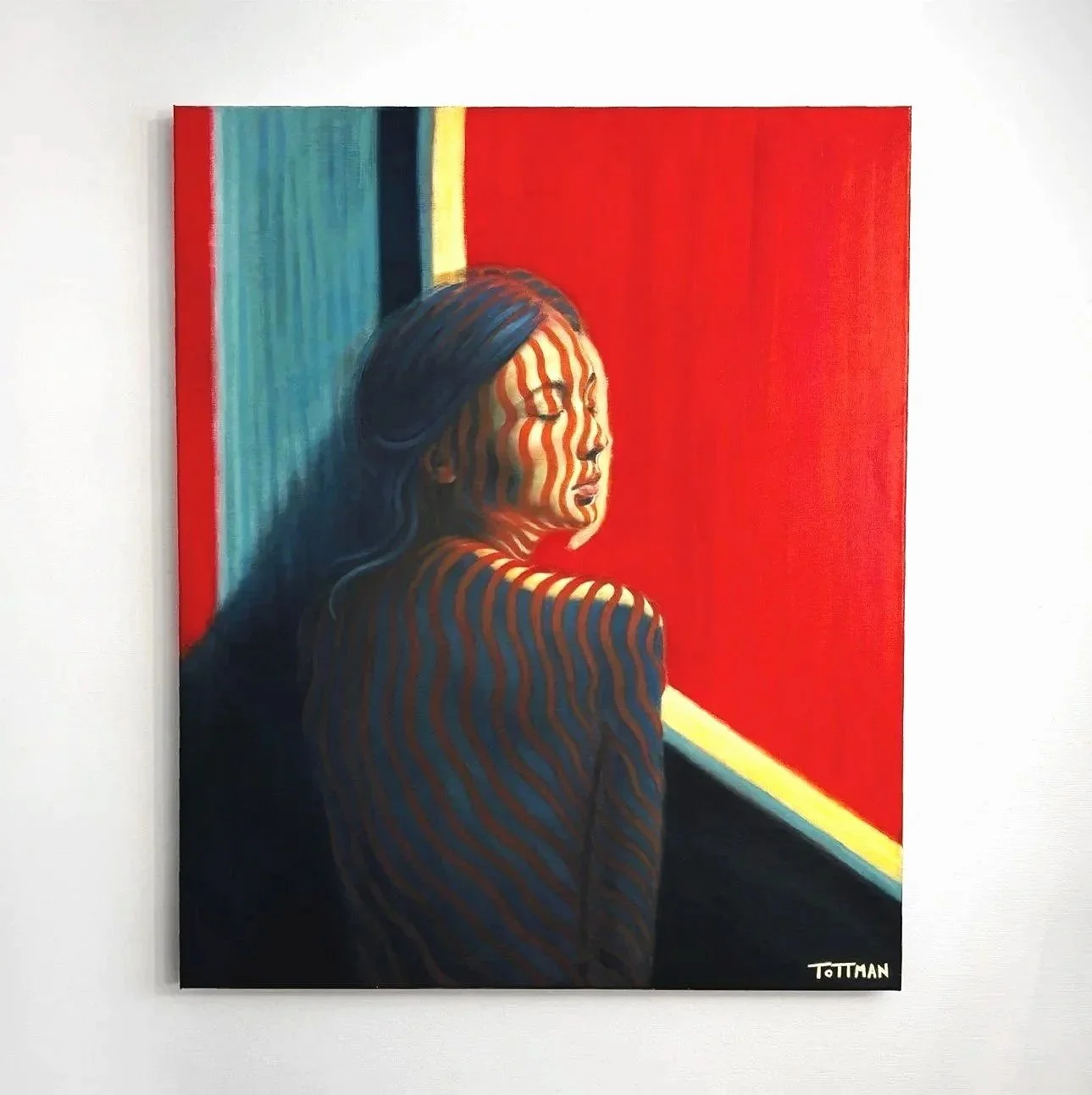 A painting of a woman with dark hair, eyes closed, facing right, with diagonal red and white stripes on her face and shoulder, set against a background with red, yellow, blue, and black sections.