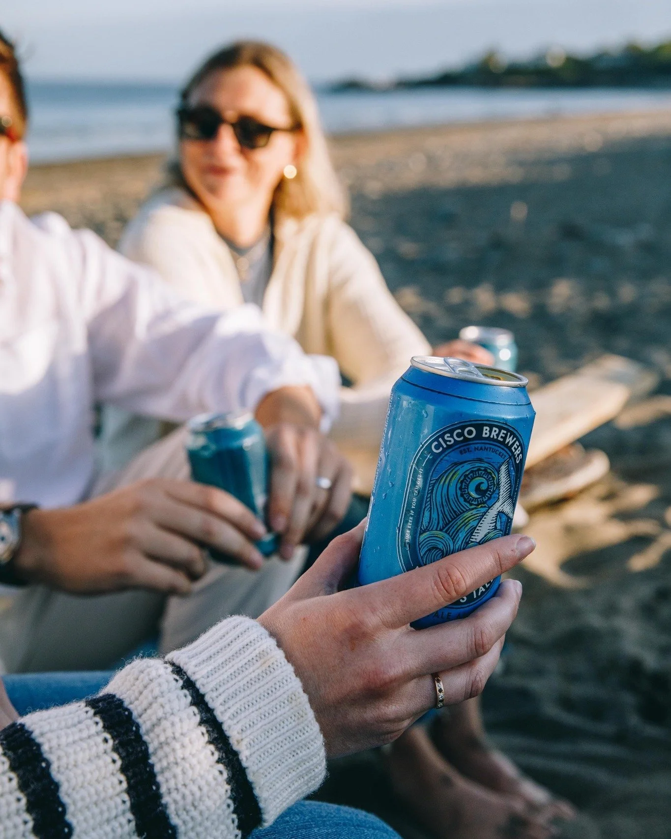 The temperature dropped, but beach plans didn't 🍻