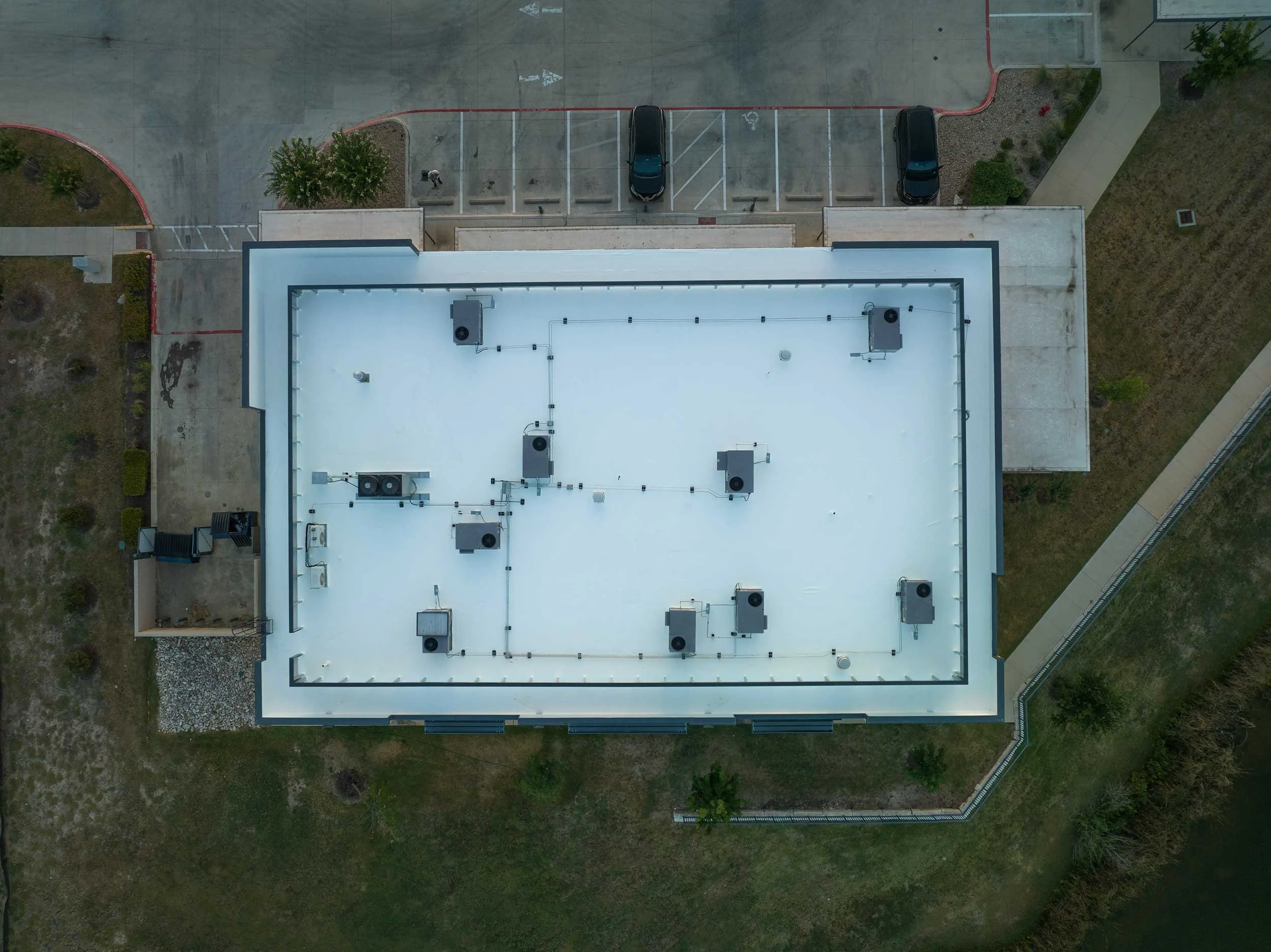 An aerial view of new epoxy roof on an ARA building in Elgin, Texas.