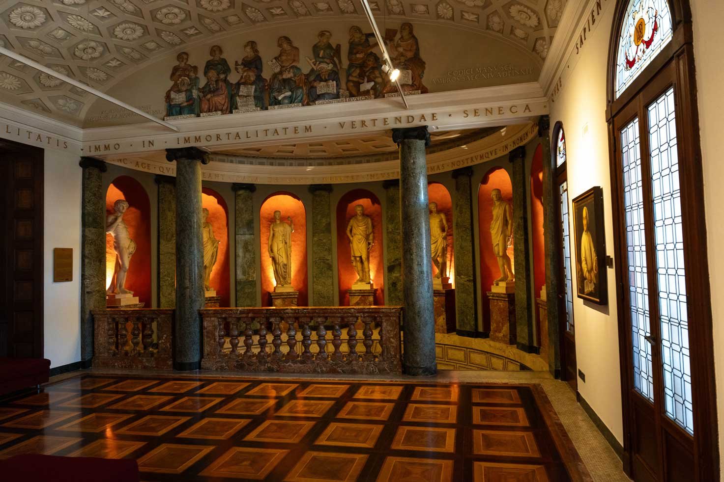 mosaic-staircase-entrance-statues.jpg