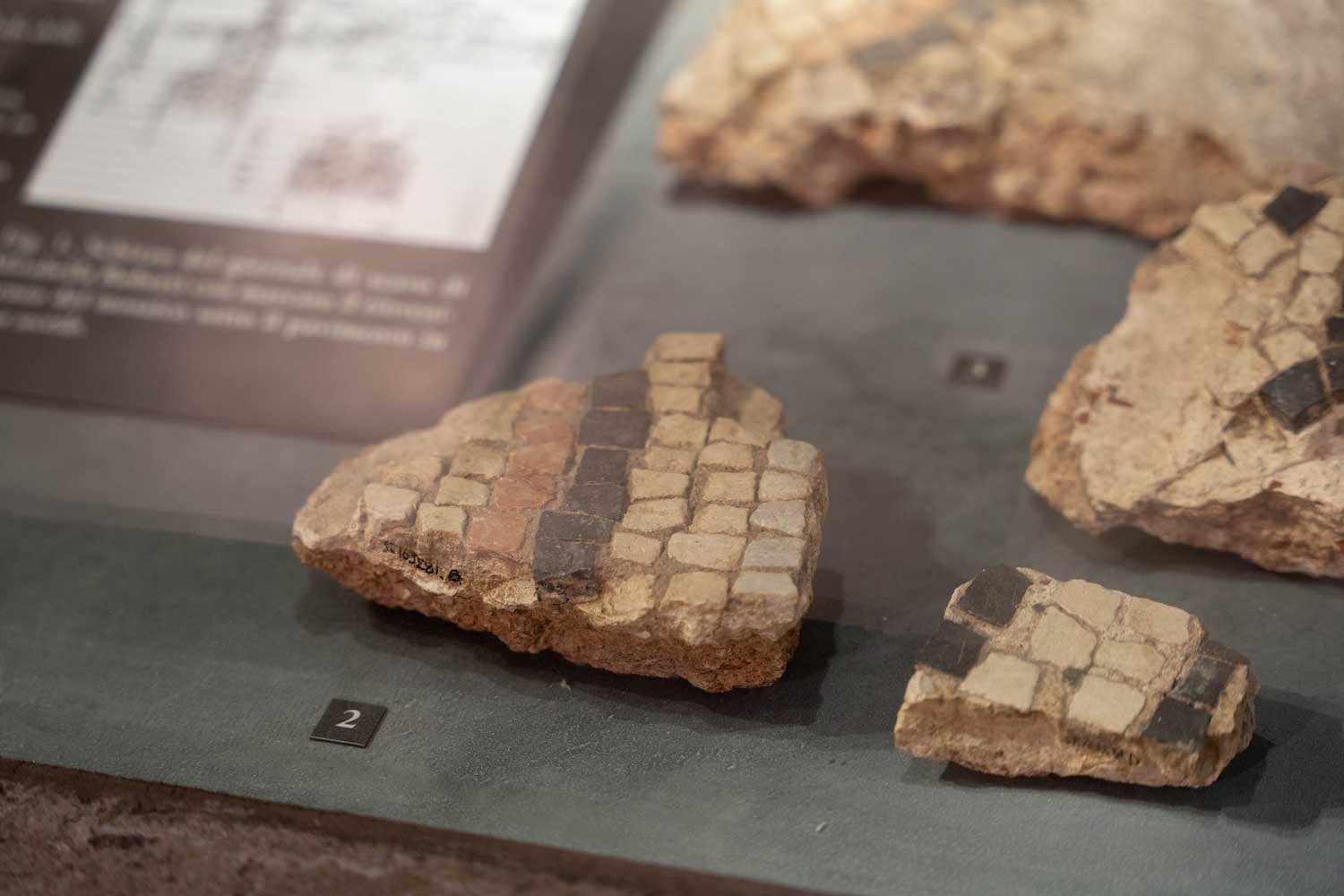 tile-fragments-closeup-archeological-area-duomo.jpg