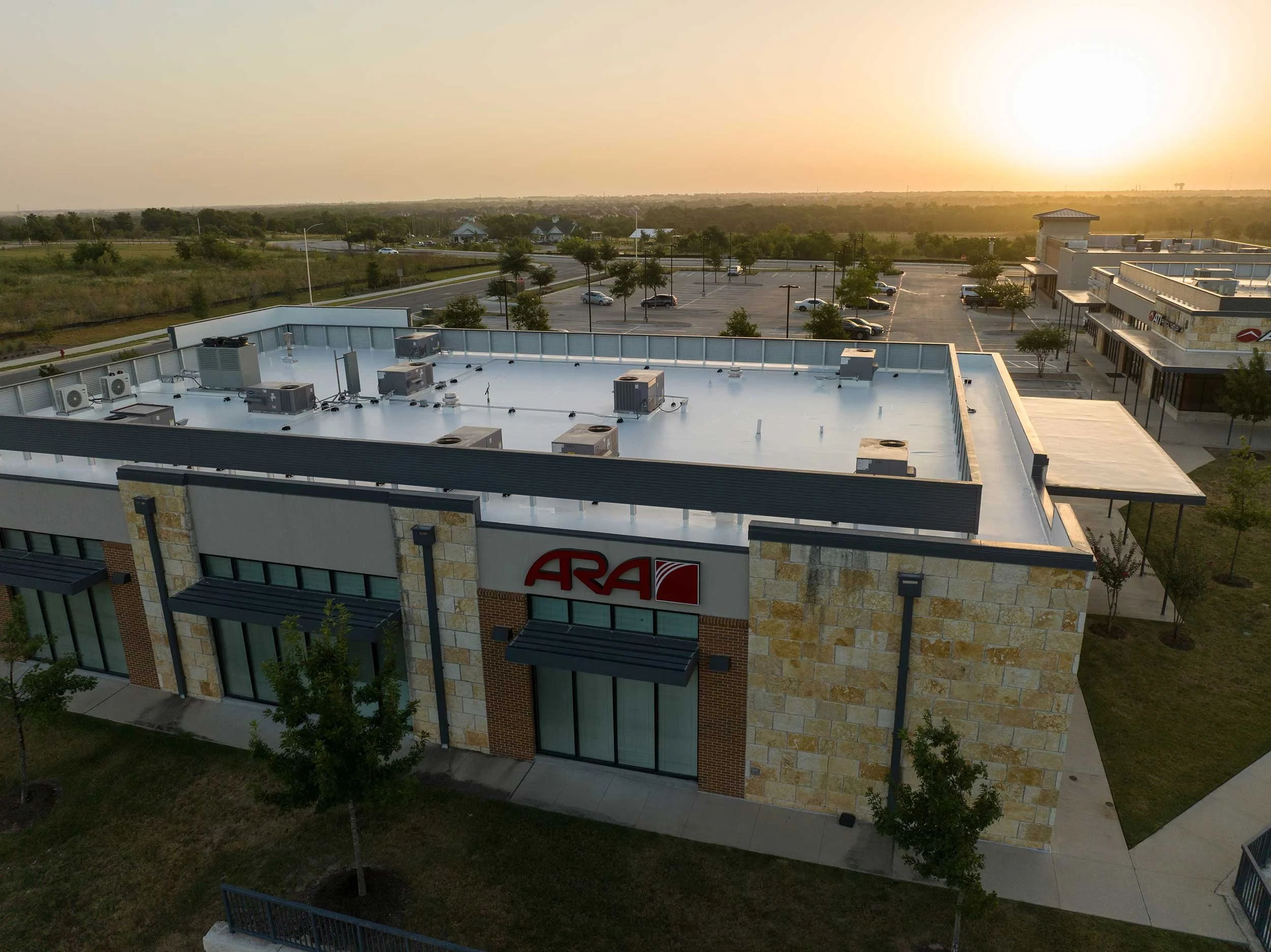 A new epoxy commercial roof in Elgin, Texas contracted by Roofing Turtle.