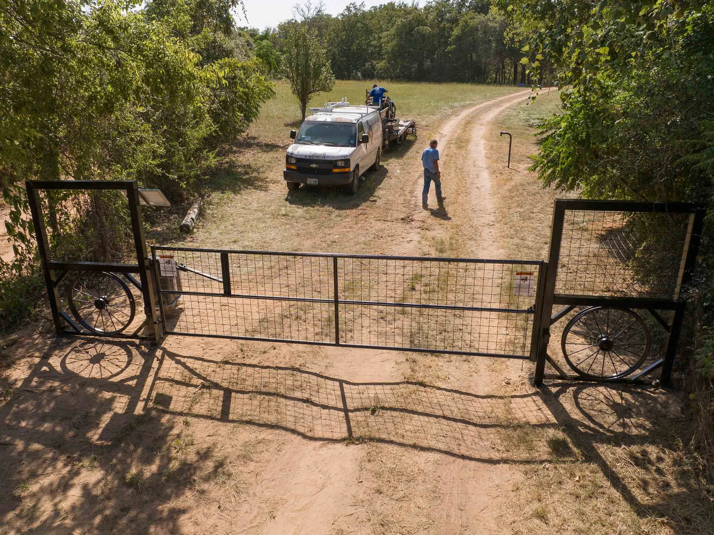 A custom gate design by Butler Contracting near Rosanky, texas.