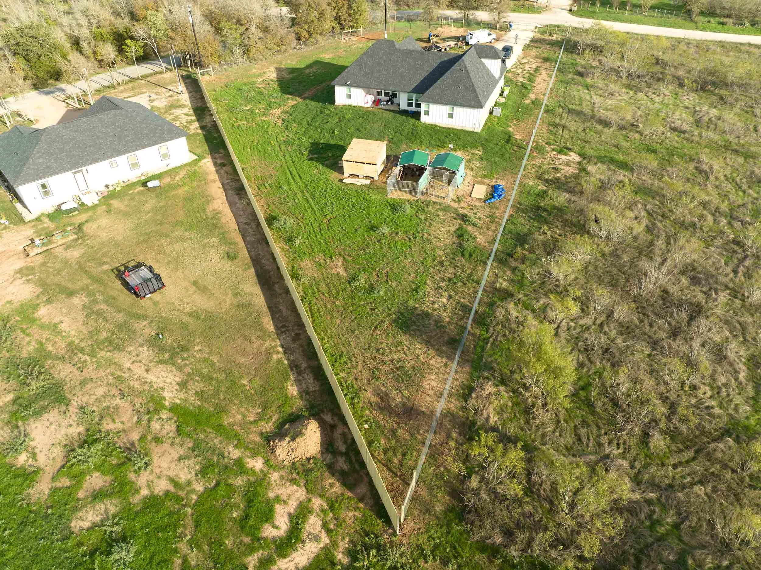 An aerial view of a fence installed by Butler Contracting in Bastrop, Texas.