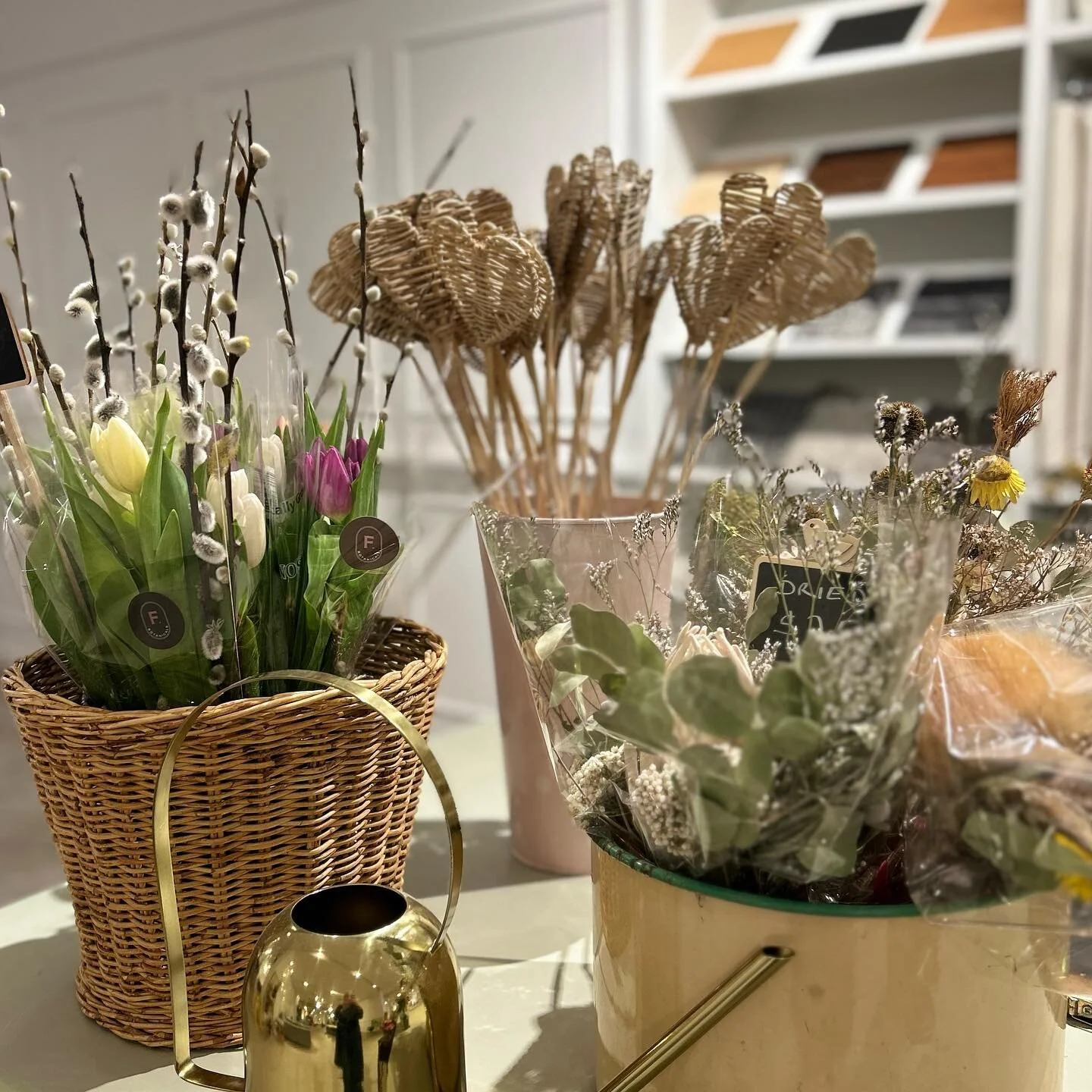 All set up at EQ3! 
5 bottle in metal holder flowers $75
Sweet eye roses bunches $45
Fresh Bunches $35
Tulips and pussy willow $15
Hyacinths $15
Dried bunches $25