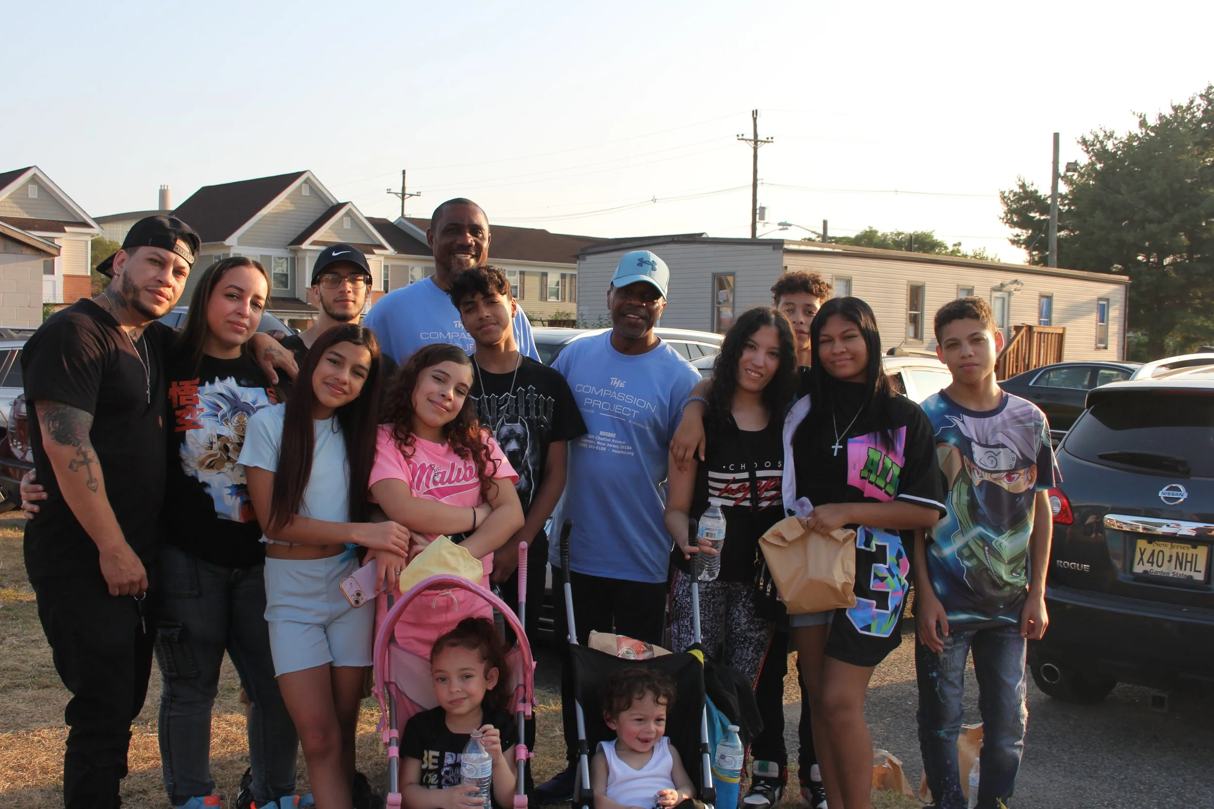 Pastor Best with newly baptized members Anthony Calderon and family.JPG