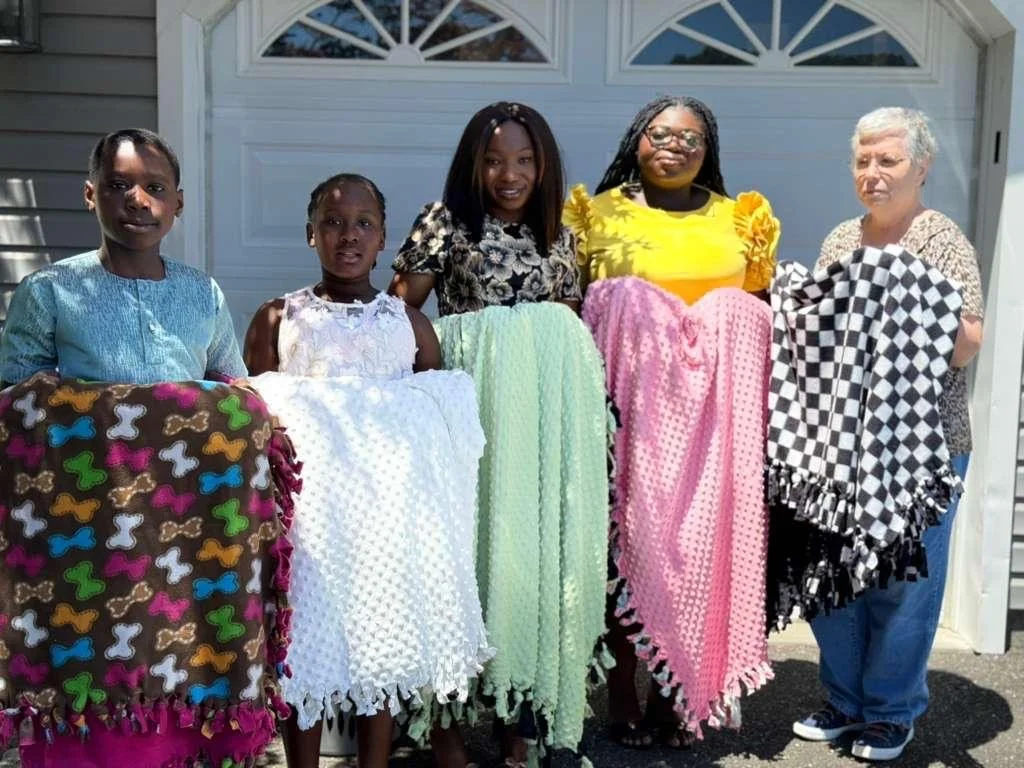 New Life Ghanaian Children Donate Handmade Blankets to Children in Christ