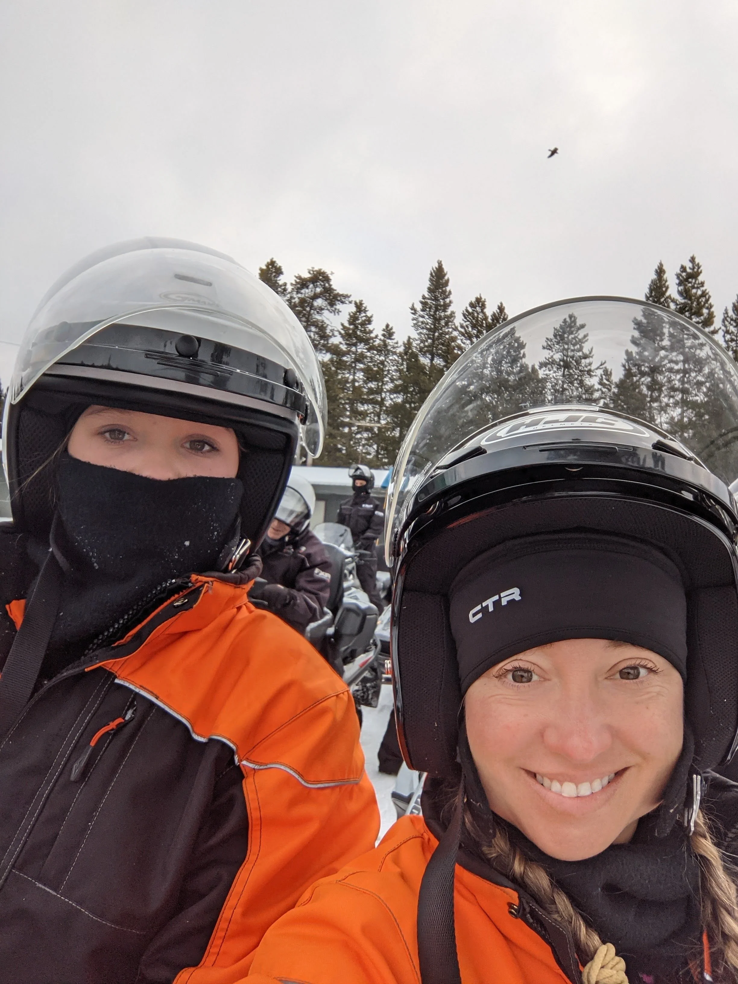 Family Snowmobiling in Yellowstone National Park with TwoTop The Old