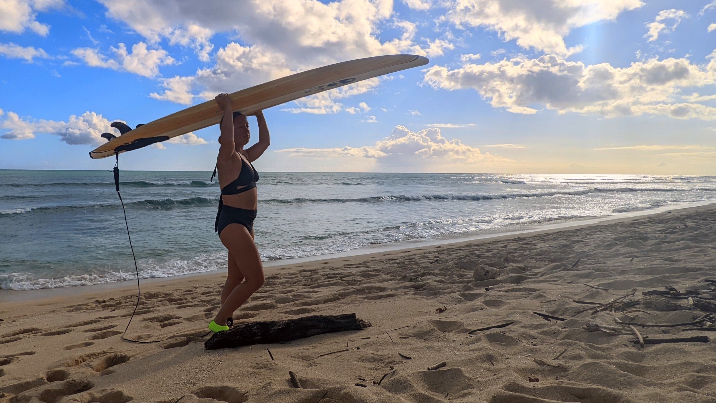 Wendi at Ewa Besach with her 8’ Gerry Lopez foamie