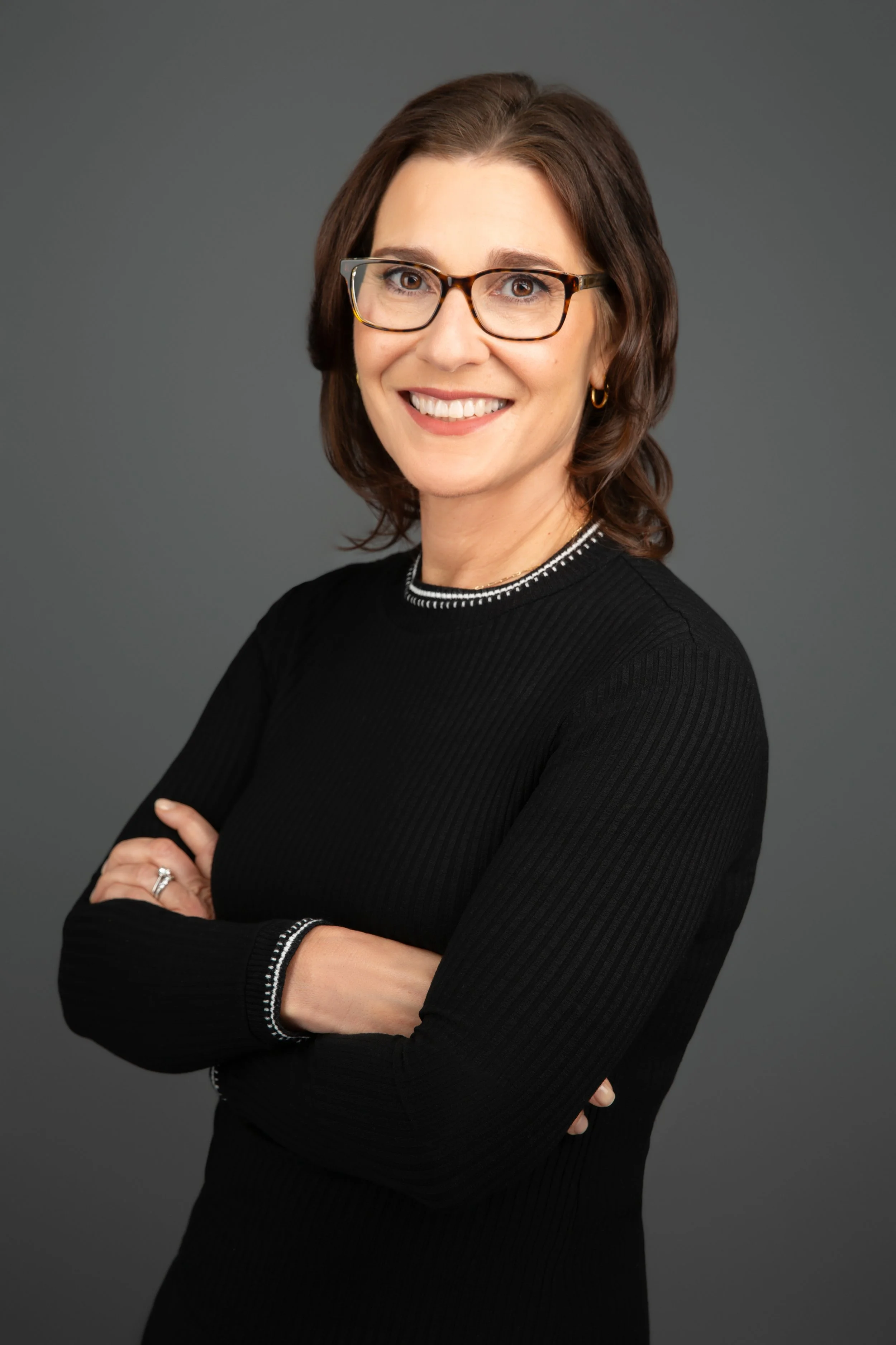Woman black shirt red glasses