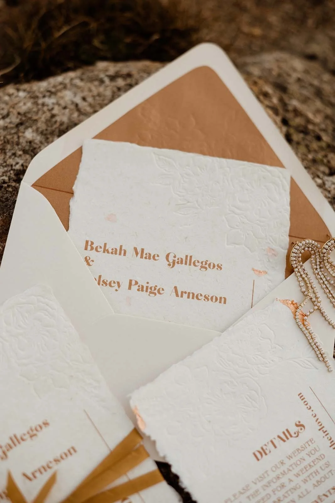blind press letterpress wedding suite with custom metallic letterpress envelope liner