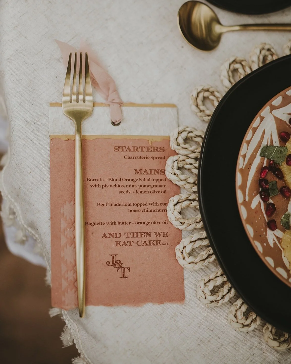 desert southwest inspired custom letterpress wedding menu with custom couples monogram, silk ribbon, and handmade stew fiber paper