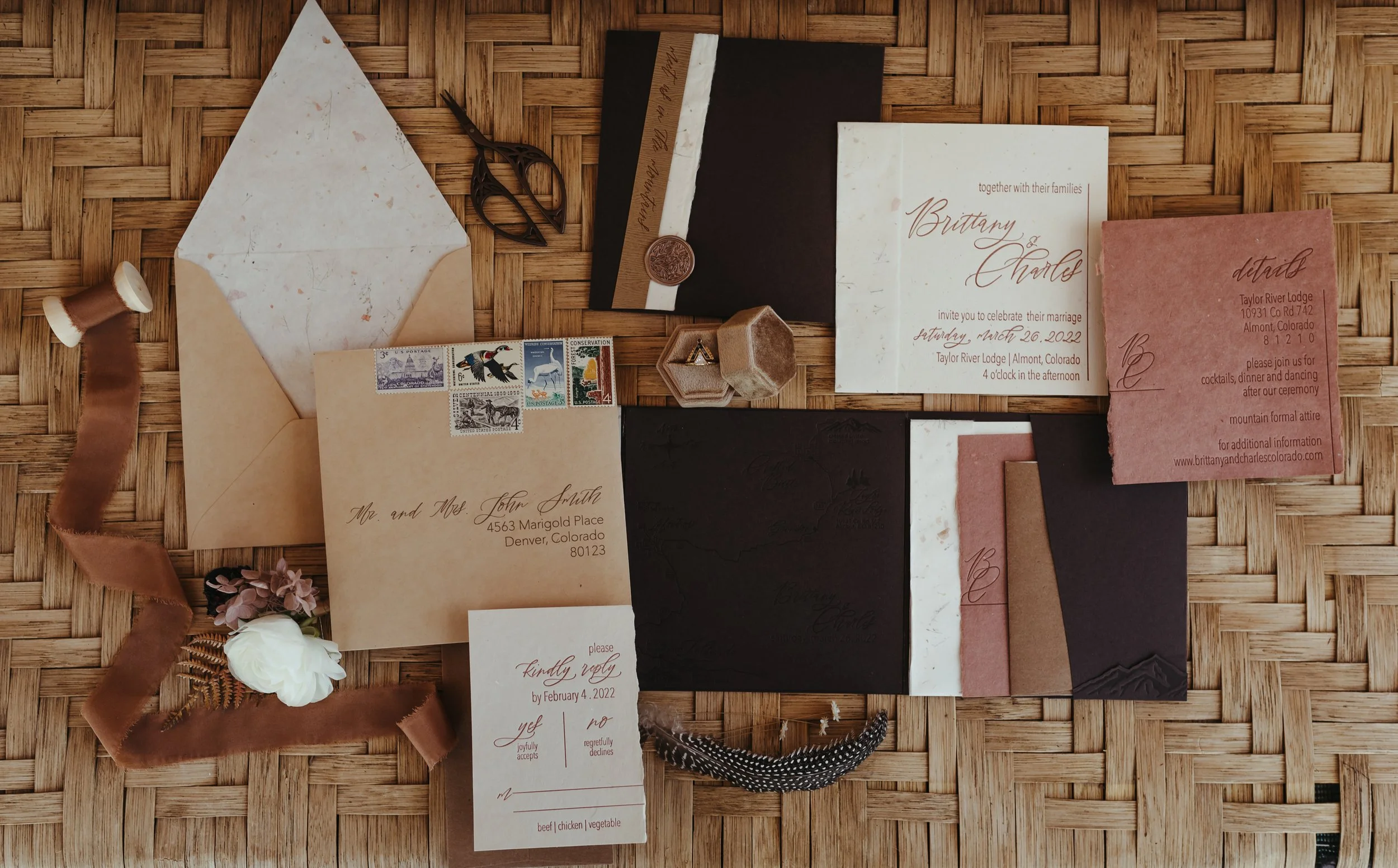 brown and blush fully custom letterpress wedding invitation suite featuring custom map, handmade mullberry papers, custom color handmade paper and vintage Colorado stamp curation.  featured in Rocky Mountain Bride Colorado winter edition 2022