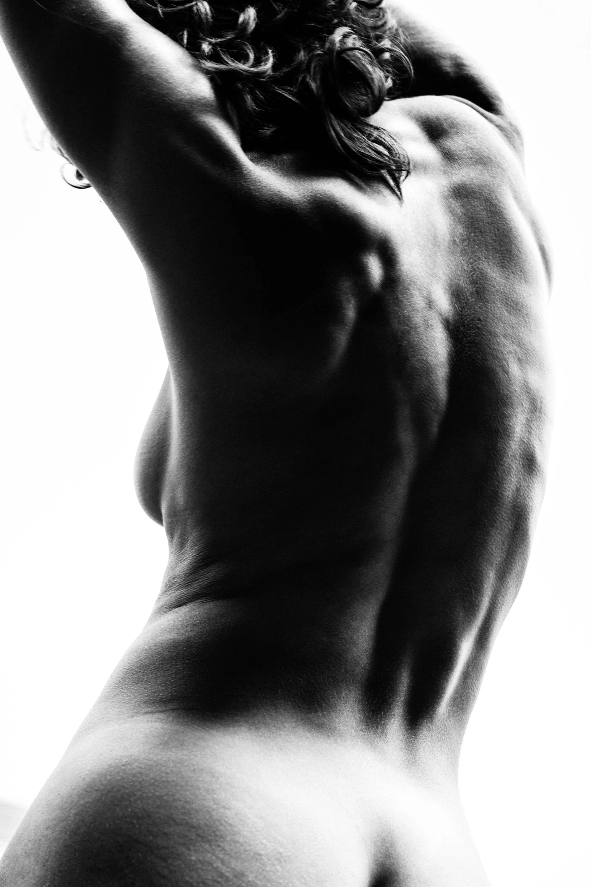 Sculpted Womanscape: Explore the seamless integration of the female form within nature's landscapes in this evocative fine art photograph.