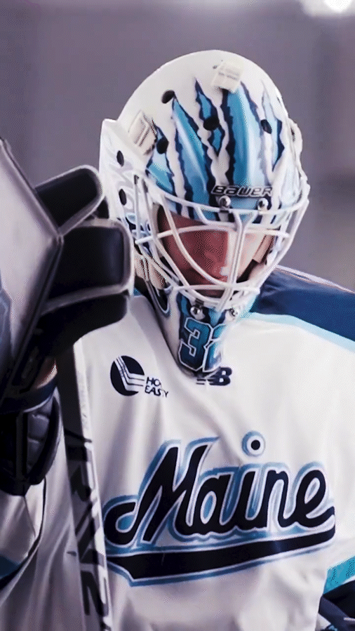 Maine hockey goalie shot.gif