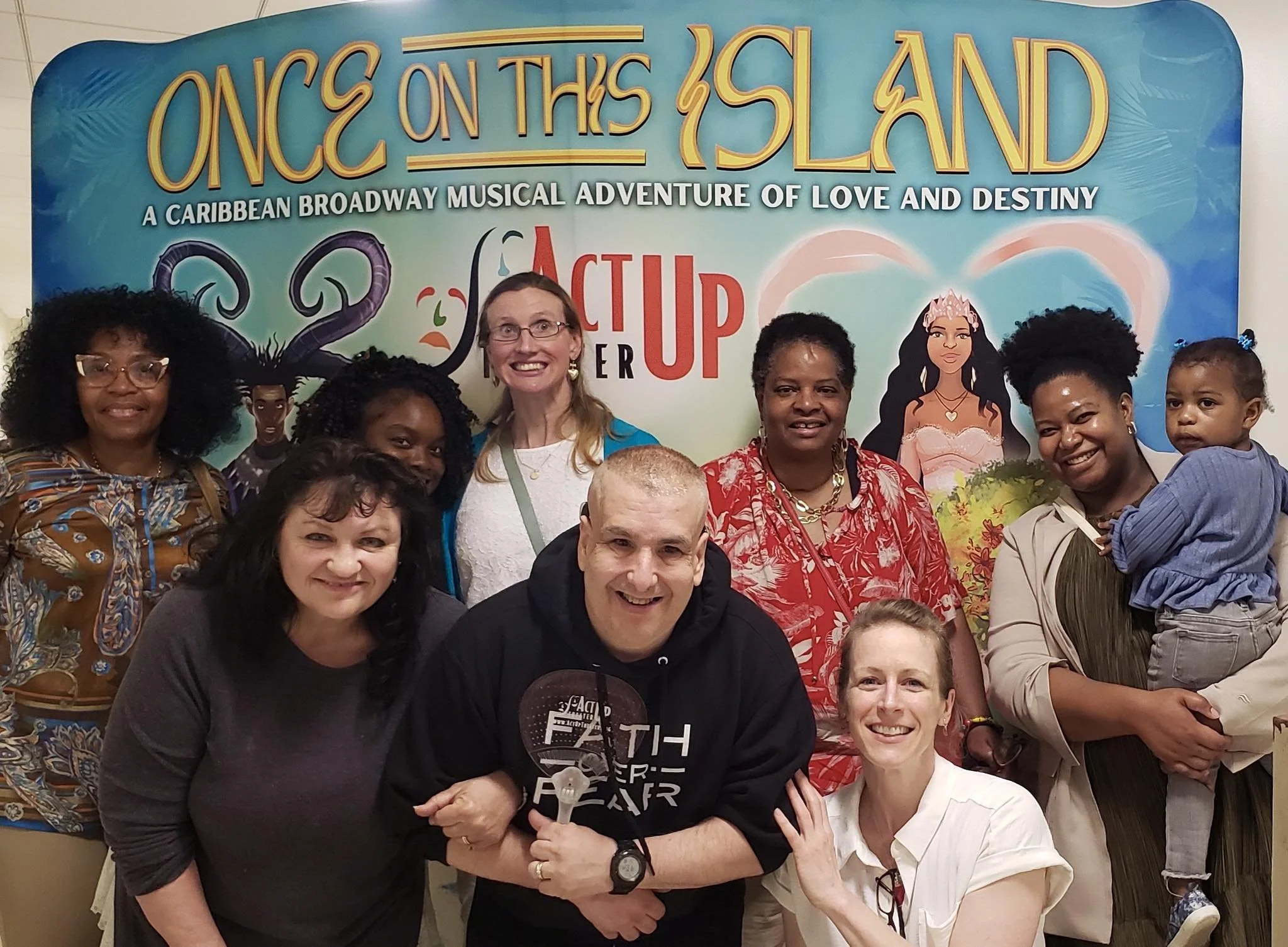 SLG ABI Waiver participants enjoying an Inspire Arts CT community outing while attending a live performance of "Once on This Island," promoting community inclusion, connection, and meaningful experiences after brain injury.