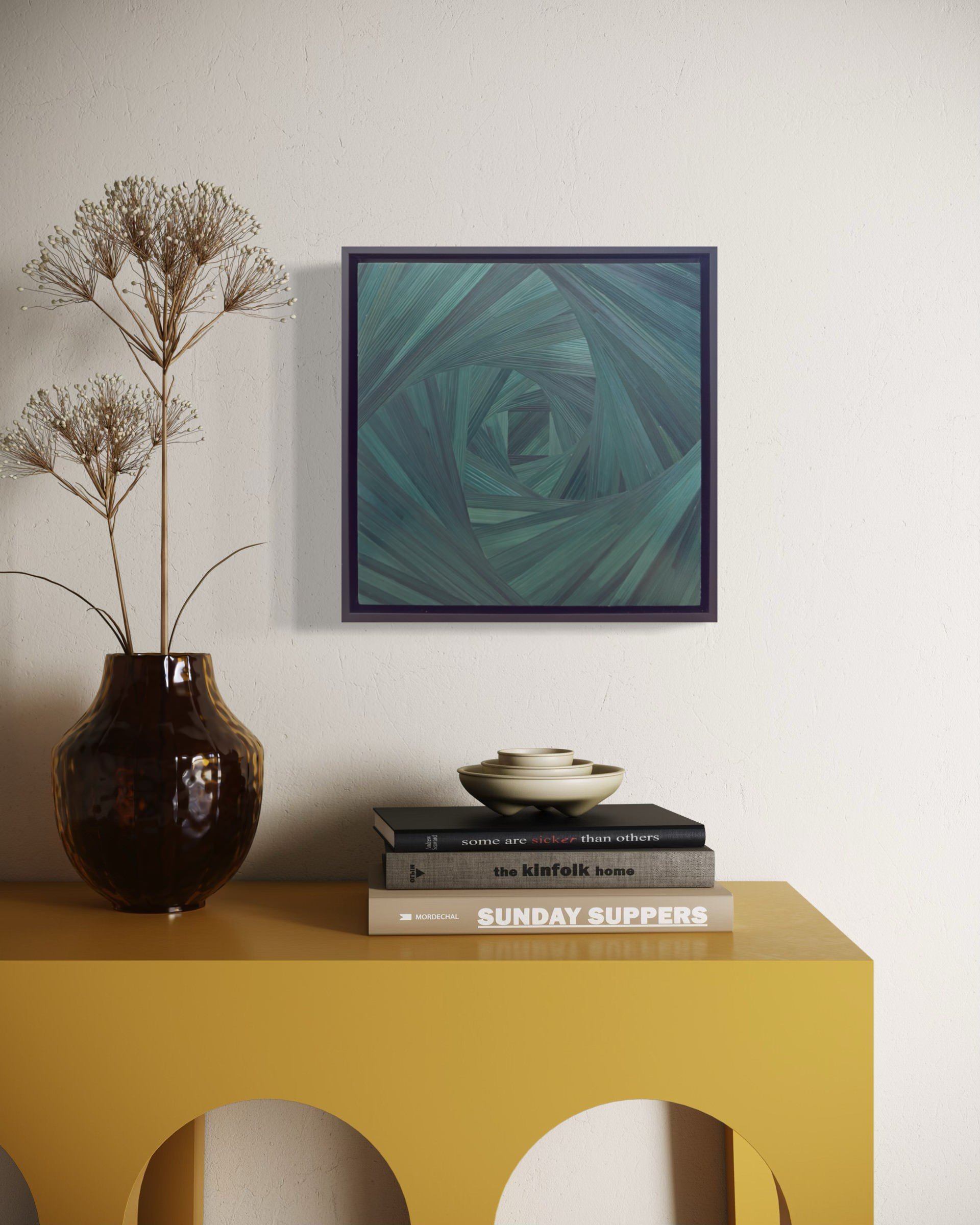 Straw marquetry fiber art in emerald green spiral pattern shown in a contemporary interior | New England artist