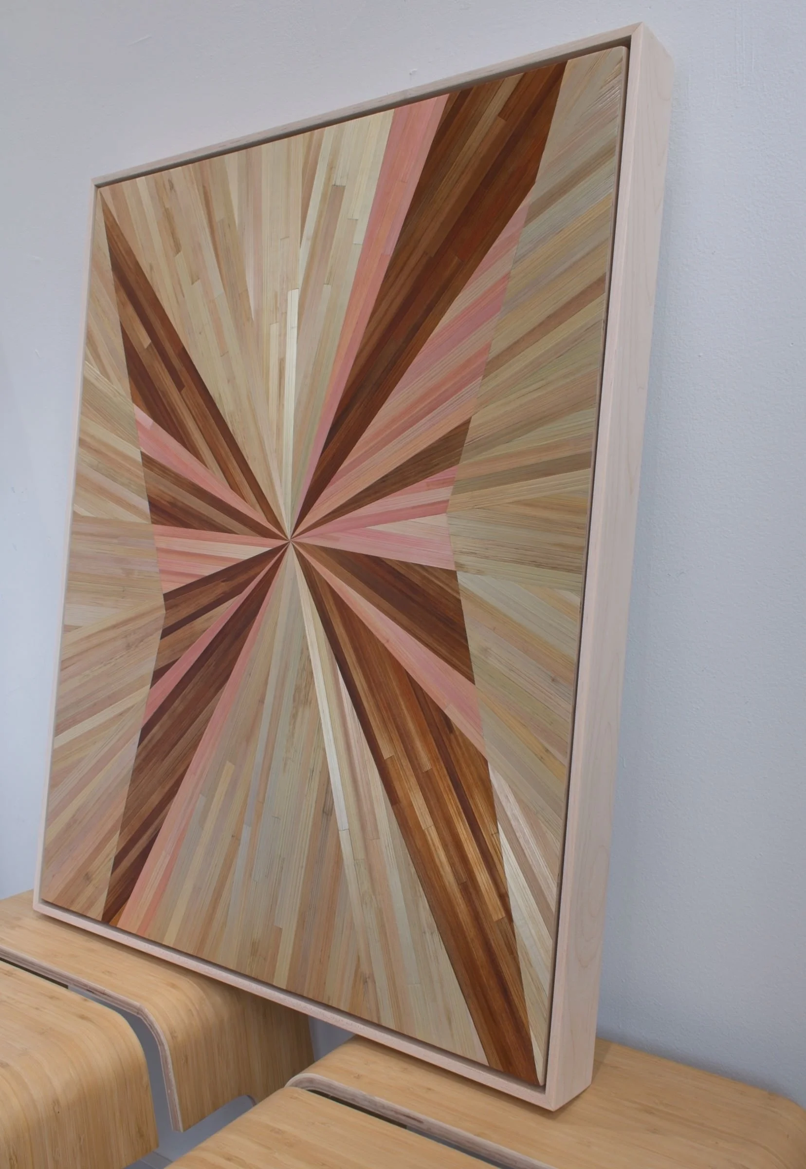 Side view of a maple float-framed straw marquetry panel showing frame depth — hand-dyed rye straw on wood, contemporary abstract wall art
