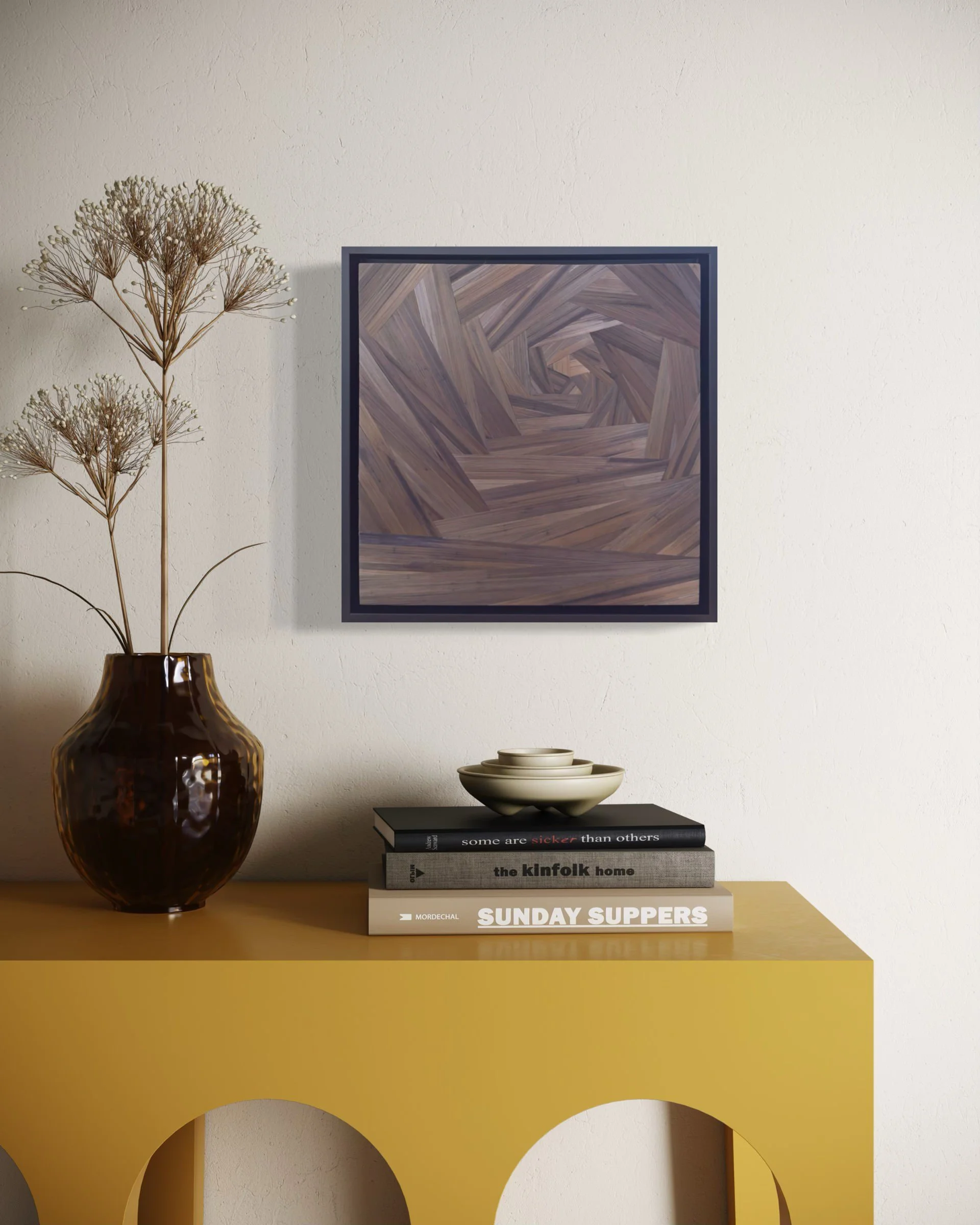 Abstract geometric straw marquetry fiber art in an asymmetrical spiral composition in brown | shown in a contemporary interior | 12x12in