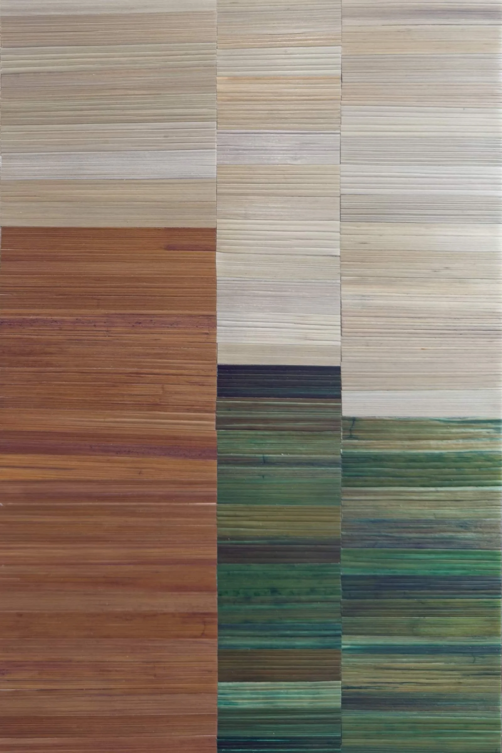 Close-up detail of contemporary abstract straw marquetry showing horizontal hand-dyed rye straw grain and organic color variation in olive green, beige, and gold