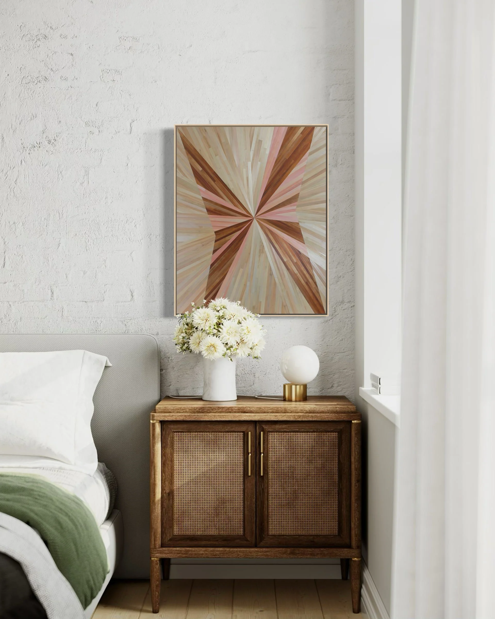 The Dreamer straw marquetry fine art, in pink, brown, and beige dyed rye straw, shown installed in a contemporary bedroom