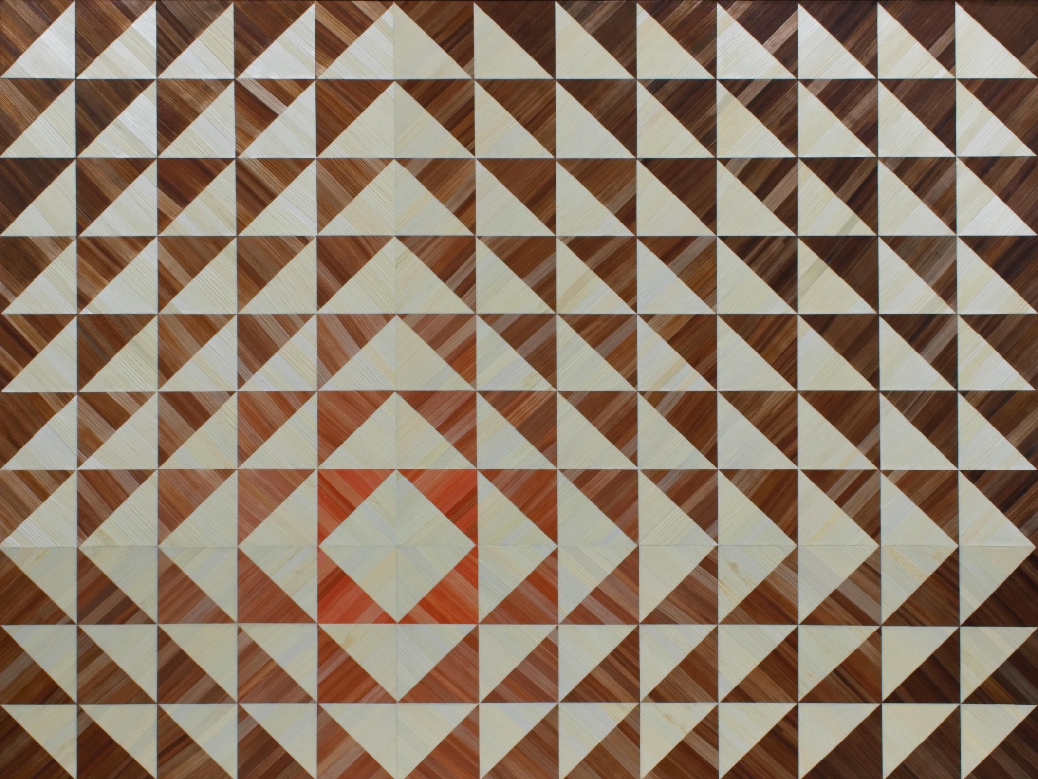 Hand-dyed straw marquetry panel with repeating triangle grid pattern; concentric rings graduating from ivory and brown at edges to coral center, 40 × 30 inches