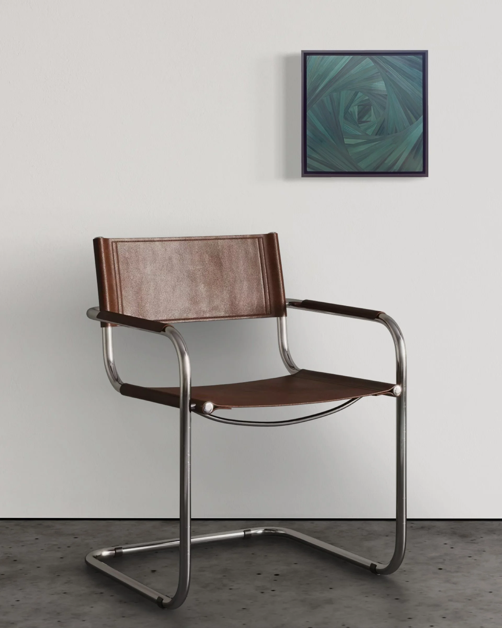 Small-scale straw marquetry panel in black float frame mounted on a plain white wall above a modern chair, showing work at 12 × 12 inches in an interior setting