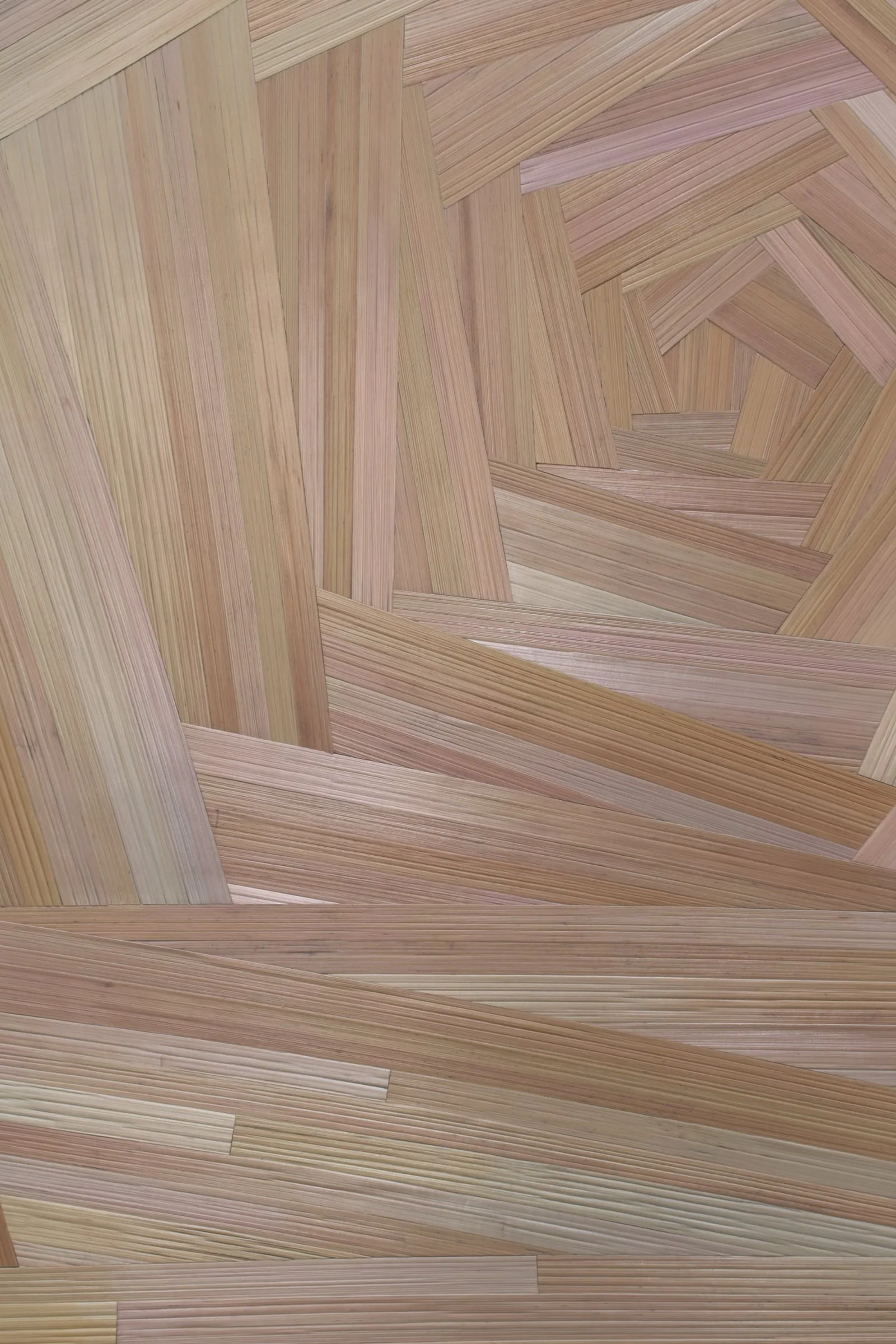 Close-up detail of straw marquetry panel Shell showing the organic texture of hand-laid rye straw, fine parallel fibers, and the iridescent blush pink and silver surface