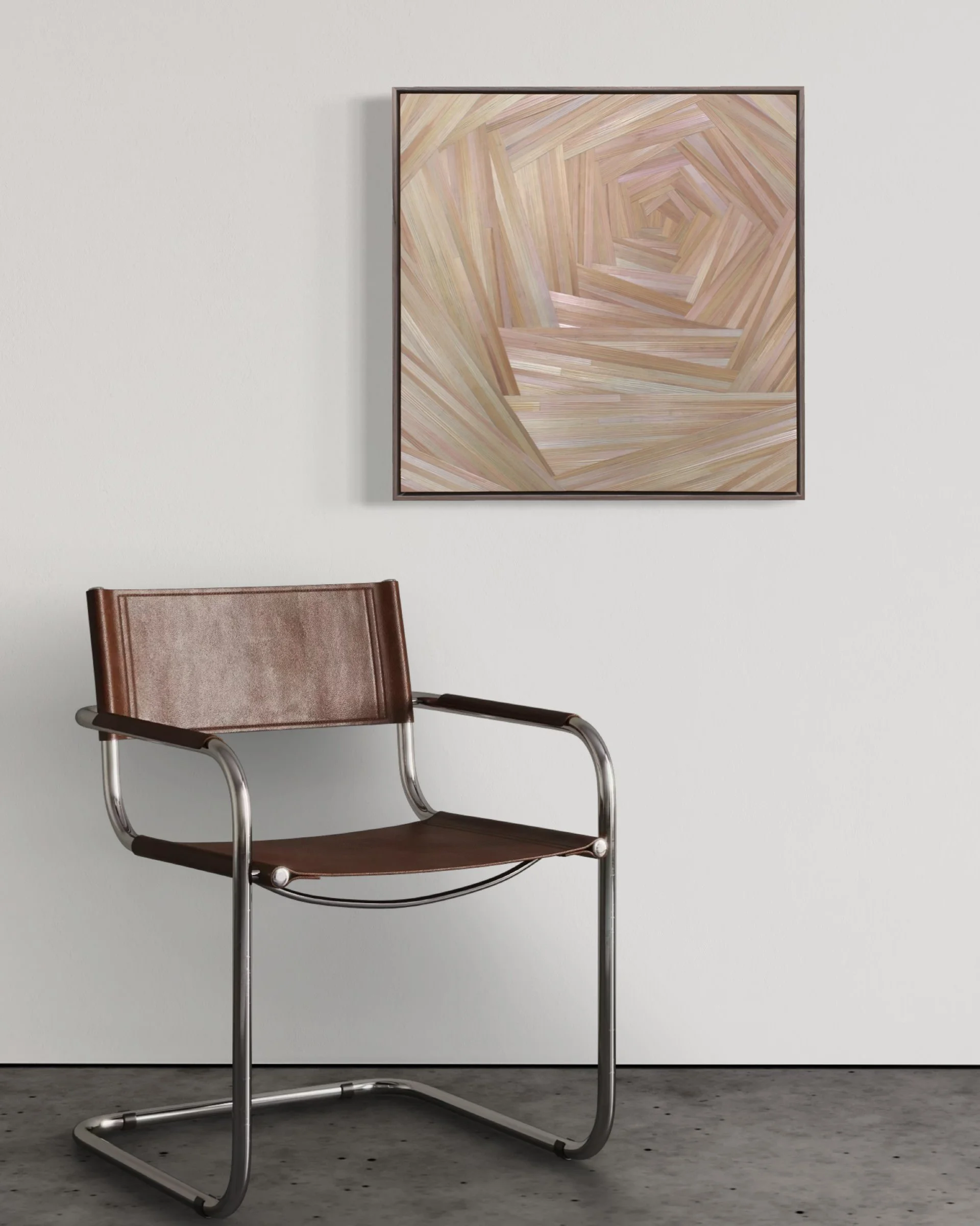 Straw marquetry wall art panel Shell by Sarah Schwartz displayed on a plain white wall above a modern chair, float-framed in walnut, 24 × 24 inches