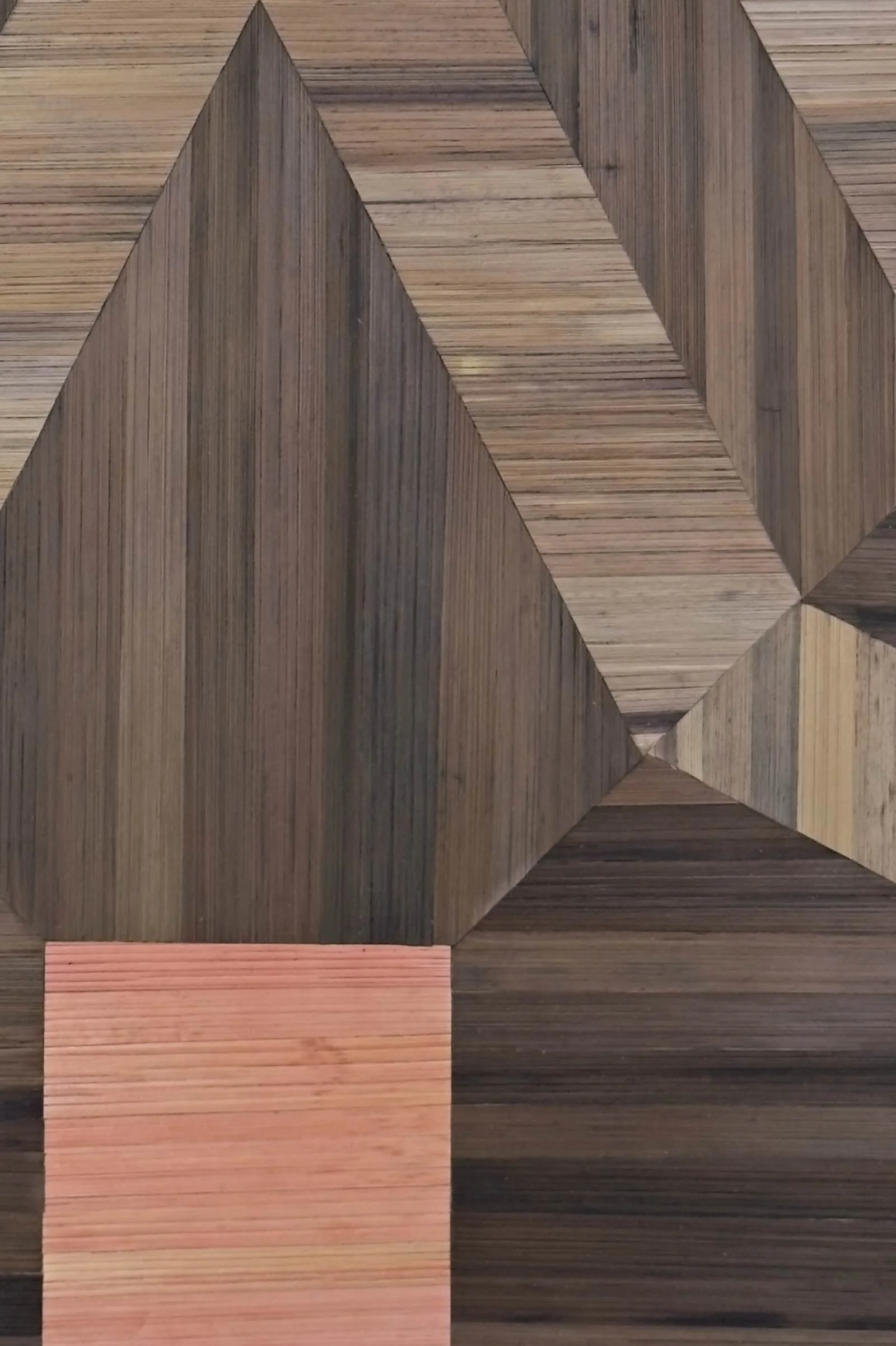 Close-up detail of Guided Home straw marquetry showing the organic texture of hand-cut rye straw in brown, gray, and pink with natural glossy sheen and precise geometric patterning
