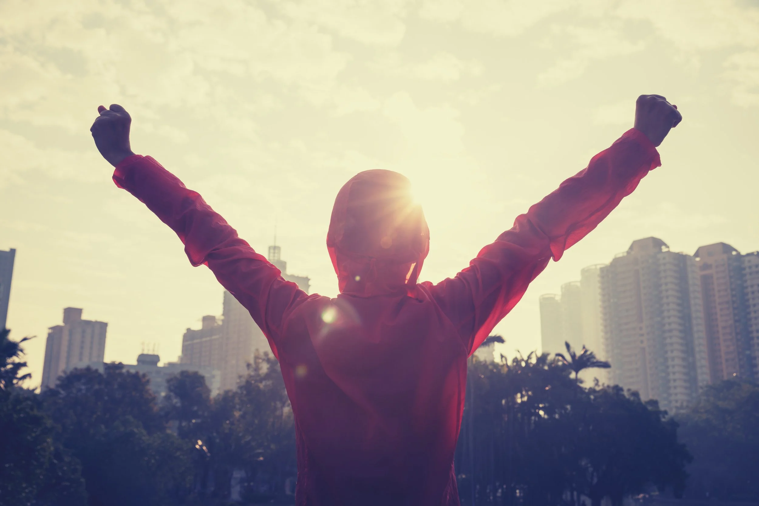 Person with arms outstretched