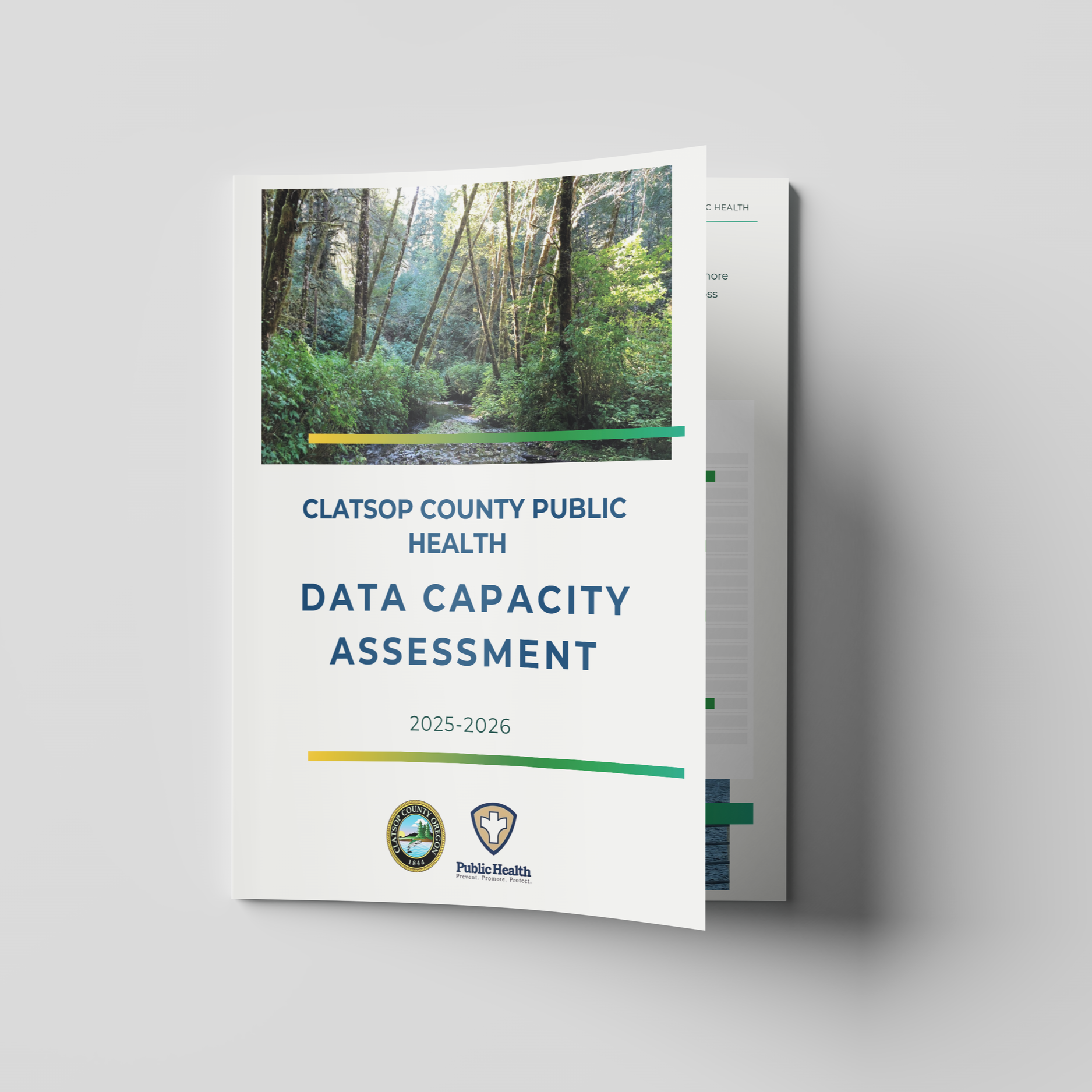 Cover page of a public health report for Clatsop County, Oregon, titled 'Data Capacity Assessment 2025-2026,' featuring a forest scene with trees and sunlight, and logos of Clatsop County and Public Health.