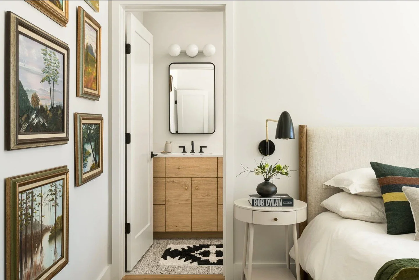 The white oak bathroom vanity + the tailored bunk beds located downstairs in the bunk room made by the team at Roots, added a nice touch to this net-ready zero-energy home, designed by @eld.architecture!⁠
⁠
#rootsbuildersvt⁠
#vermont⁠
#finehomebuilde