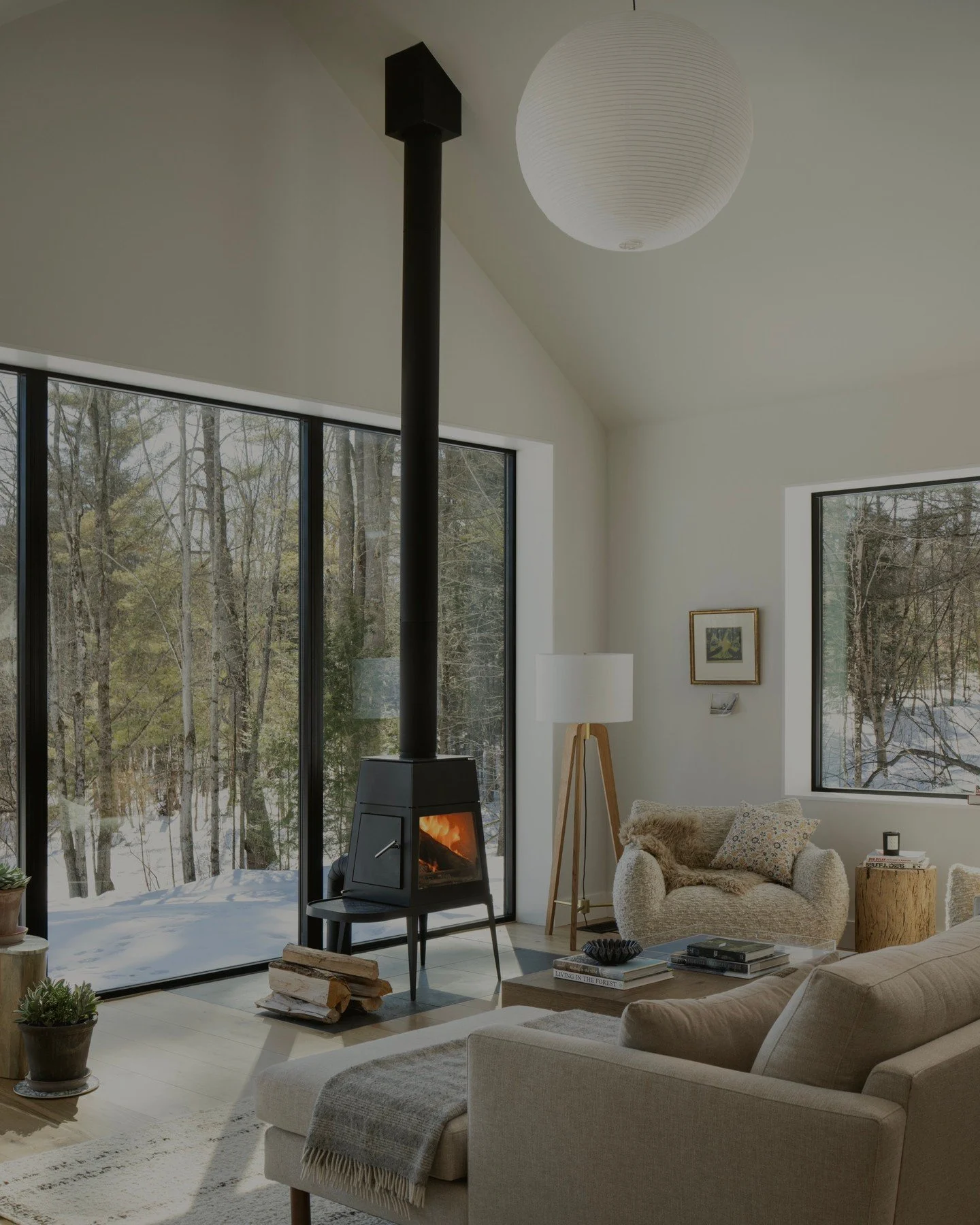 After the kitchen, there&rsquo;s this.

The room where the family lands at the end of the day. Where the fire goes on when the temperature drops. Where the windows frame the Vermont landscape like a painting that changes every season. Where the light