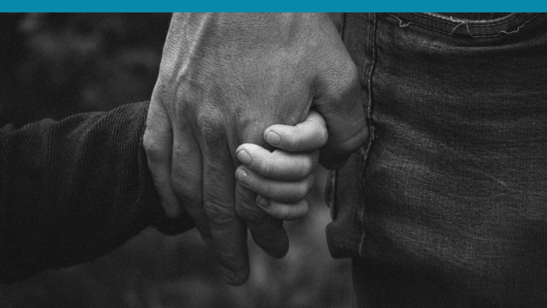 father holding his child's hand. what your family's reactions show you about yourself