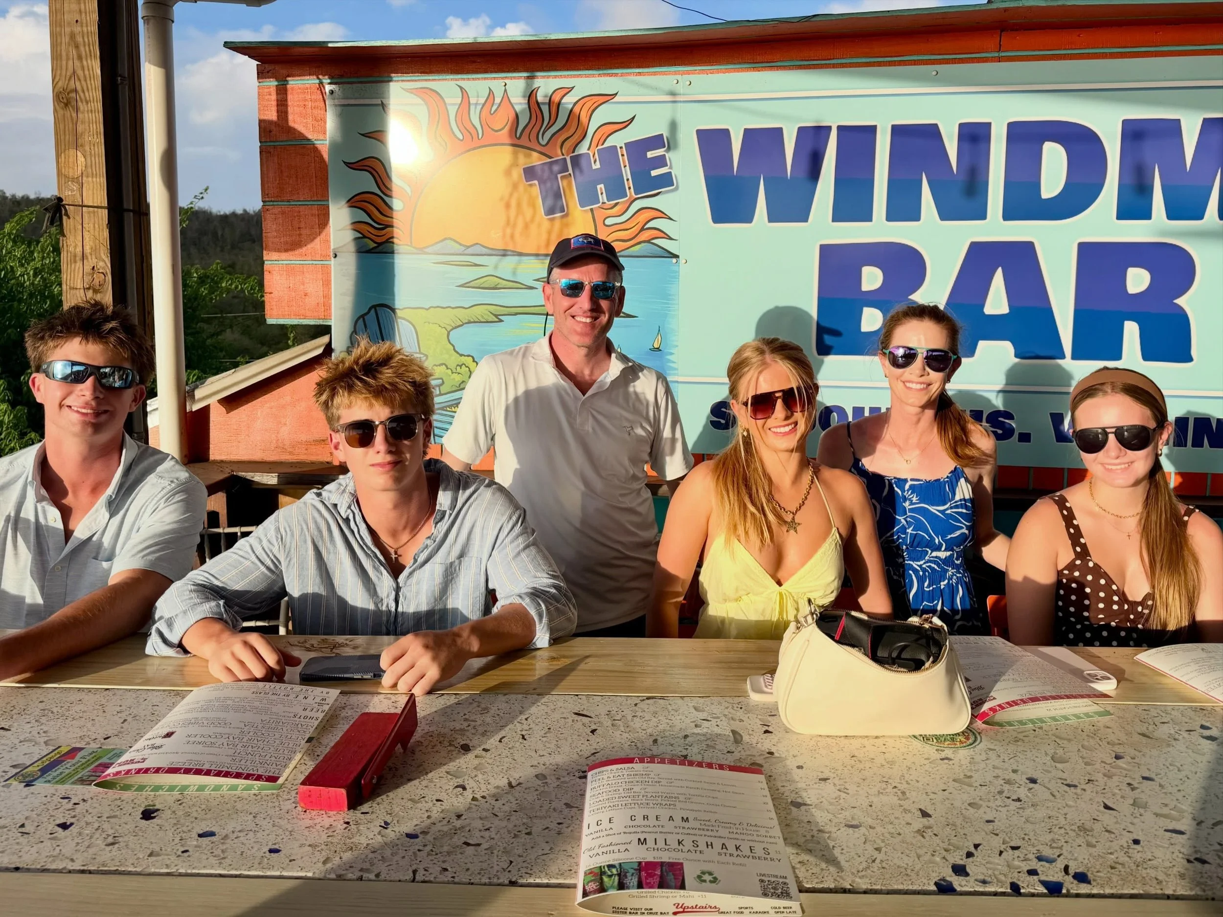Pre-gaming my 50th birthday before Abigail leaves and the kids start school. Thank you @aaronalexander_atx for planning a beautiful vacation in St. Thomas. 🩷 And when I opened my mail - my AARP card had arrived. No, thank you. I love my job and won&