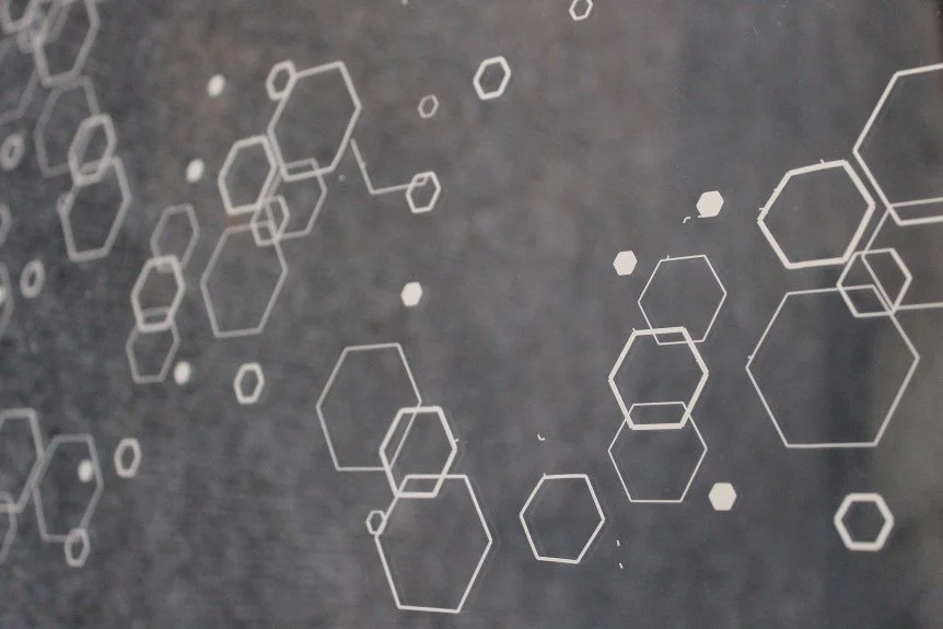 radicle Pollinator Parklet “windows” in benches from repurposed pallets.