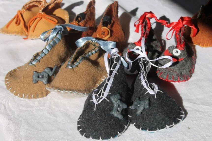 Baby booties from scrap wool and upholstery.